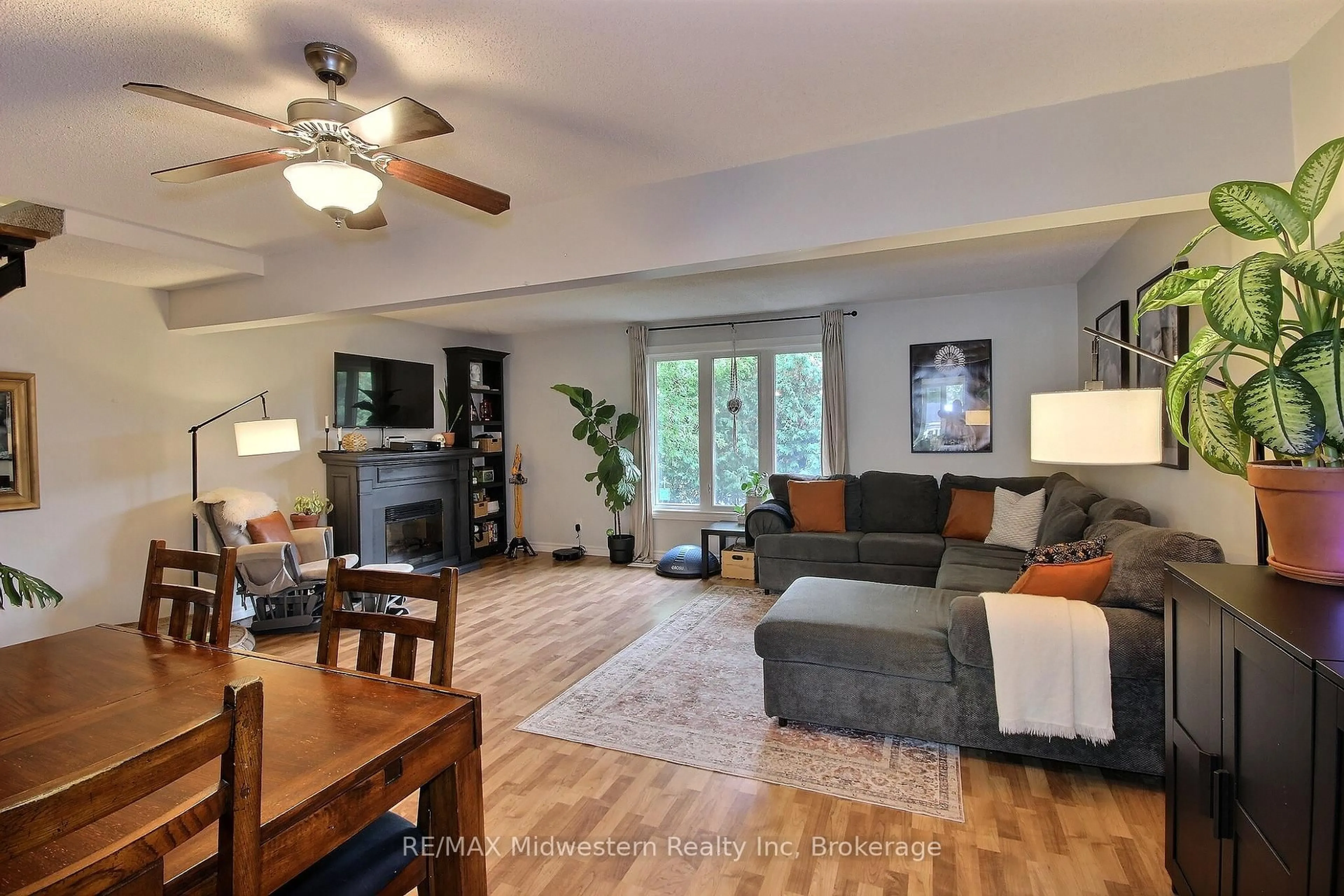 Living room with furniture, wood/laminate floor for 755 York Ave, North Perth Ontario N4W 2Y4