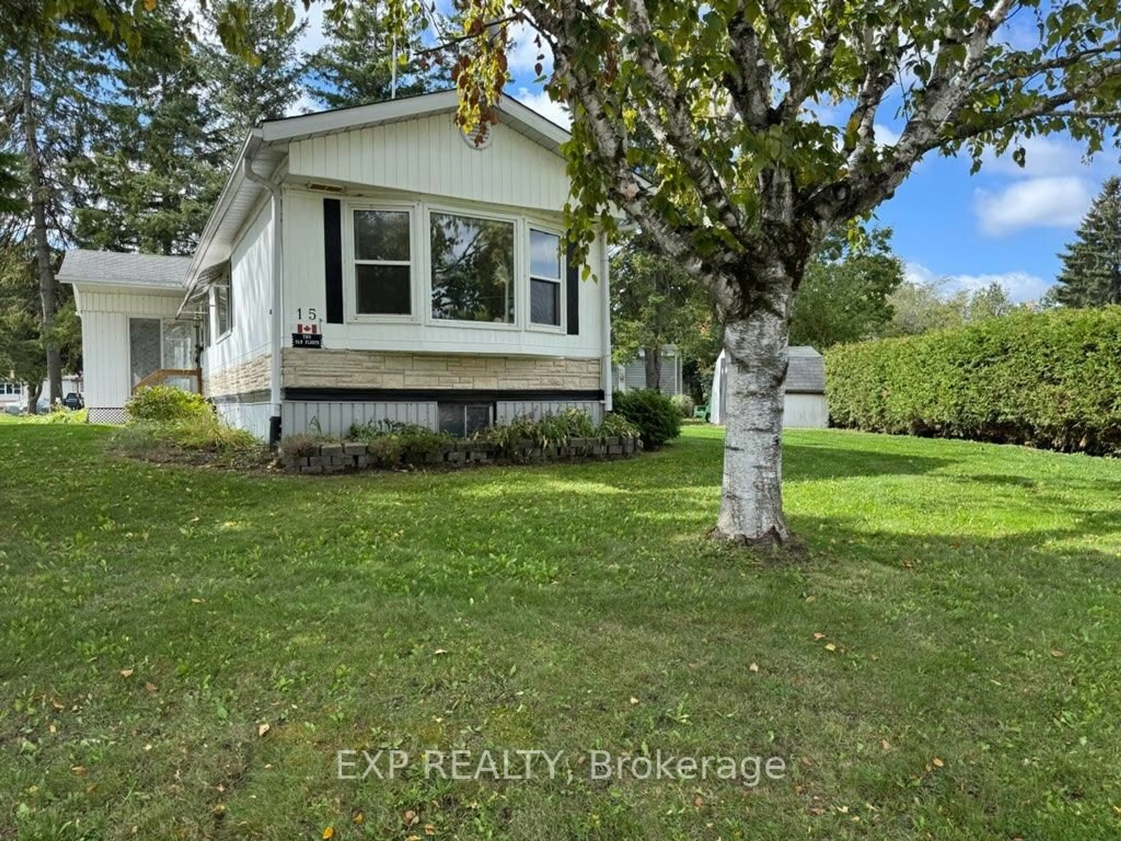 A pic from outside/outdoor area/front of a property/back of a property/a pic from drone, unknown for 15 Park Cres, Kawartha Lakes Ontario K9V 4R1