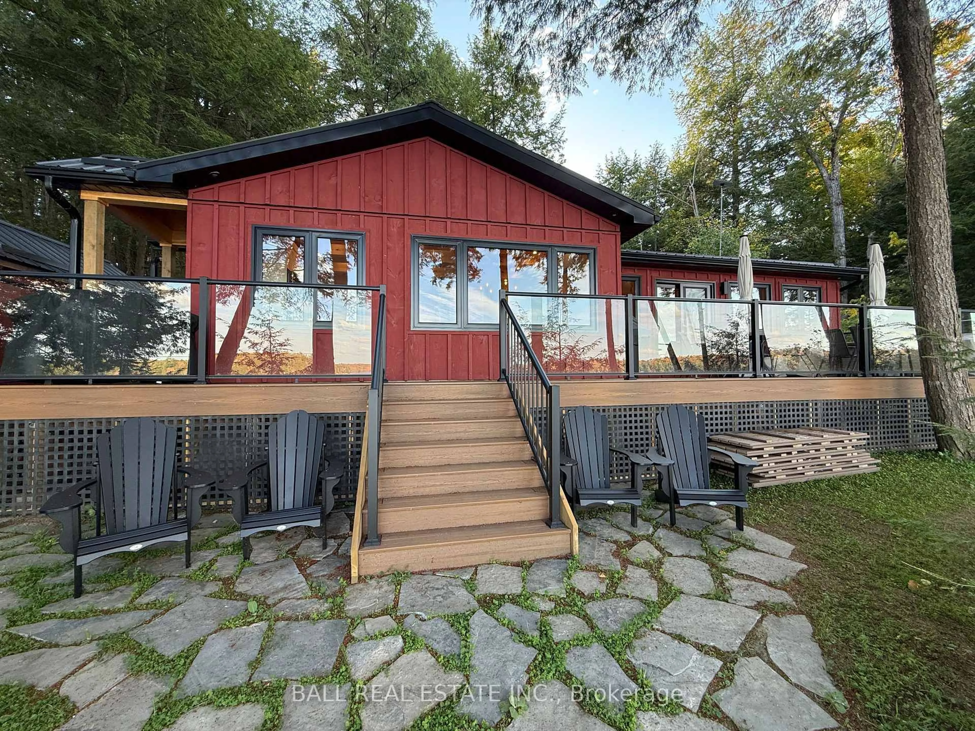 A pic from outside/outdoor area/front of a property/back of a property/a pic from drone, unknown for 133 Fire Route 214, Trent Lakes Ontario K0L 1J0