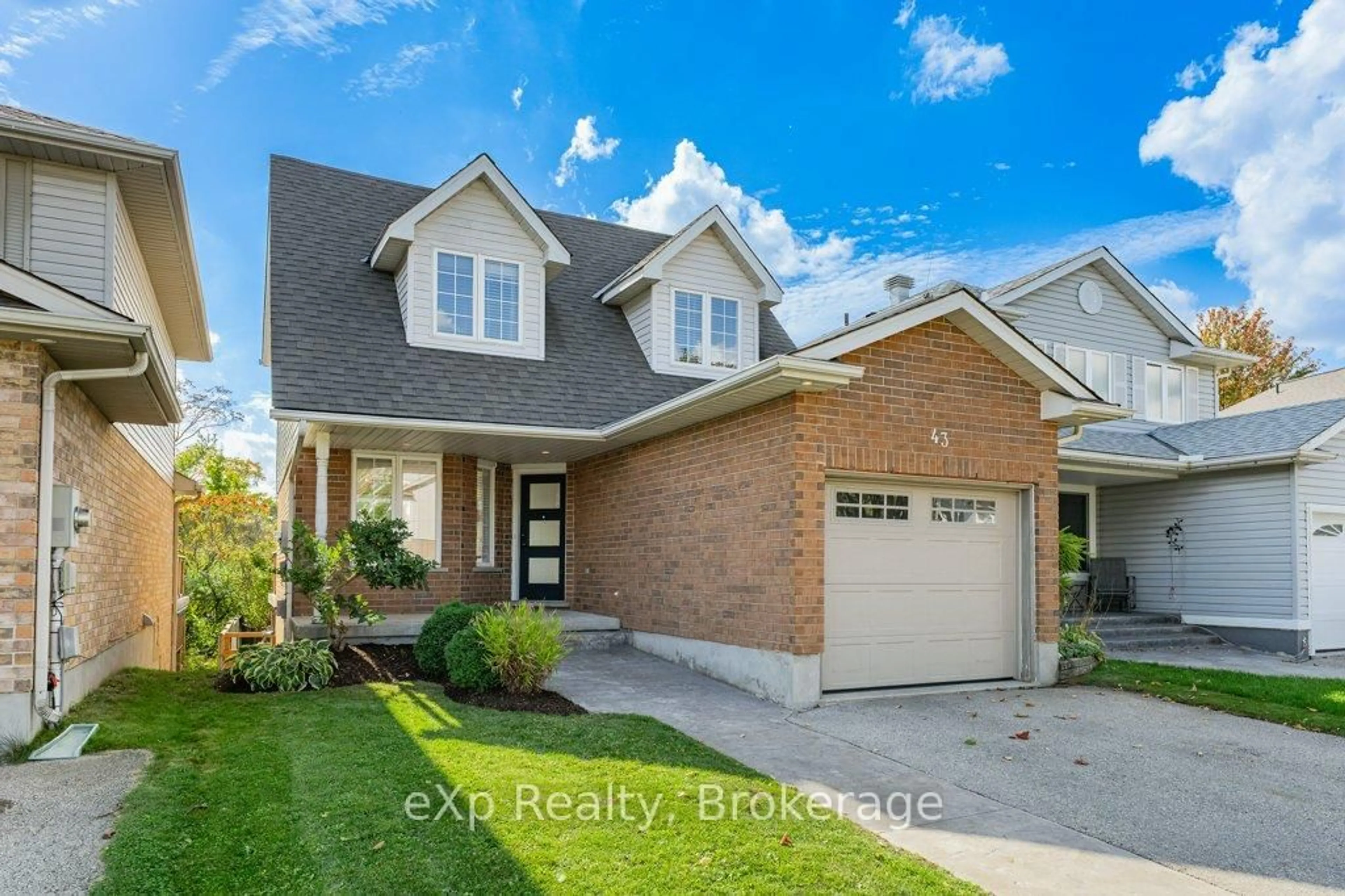 Home with brick exterior material, street for 43 Boulder Cres, Guelph Ontario N1G 5A2