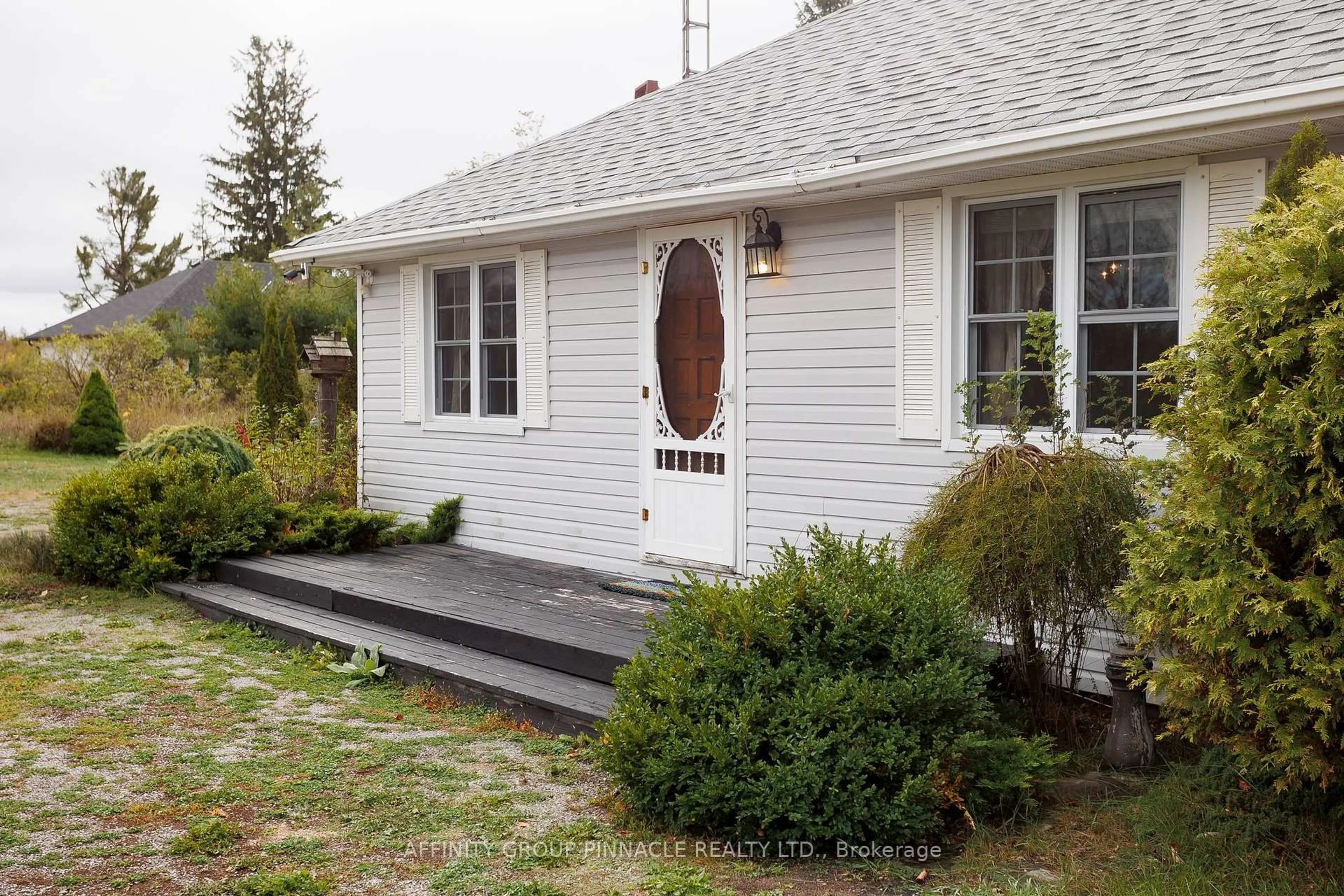 Home with vinyl exterior material, street for 1879 Victoria Rd, Kawartha Lakes Ontario K0M 2B0