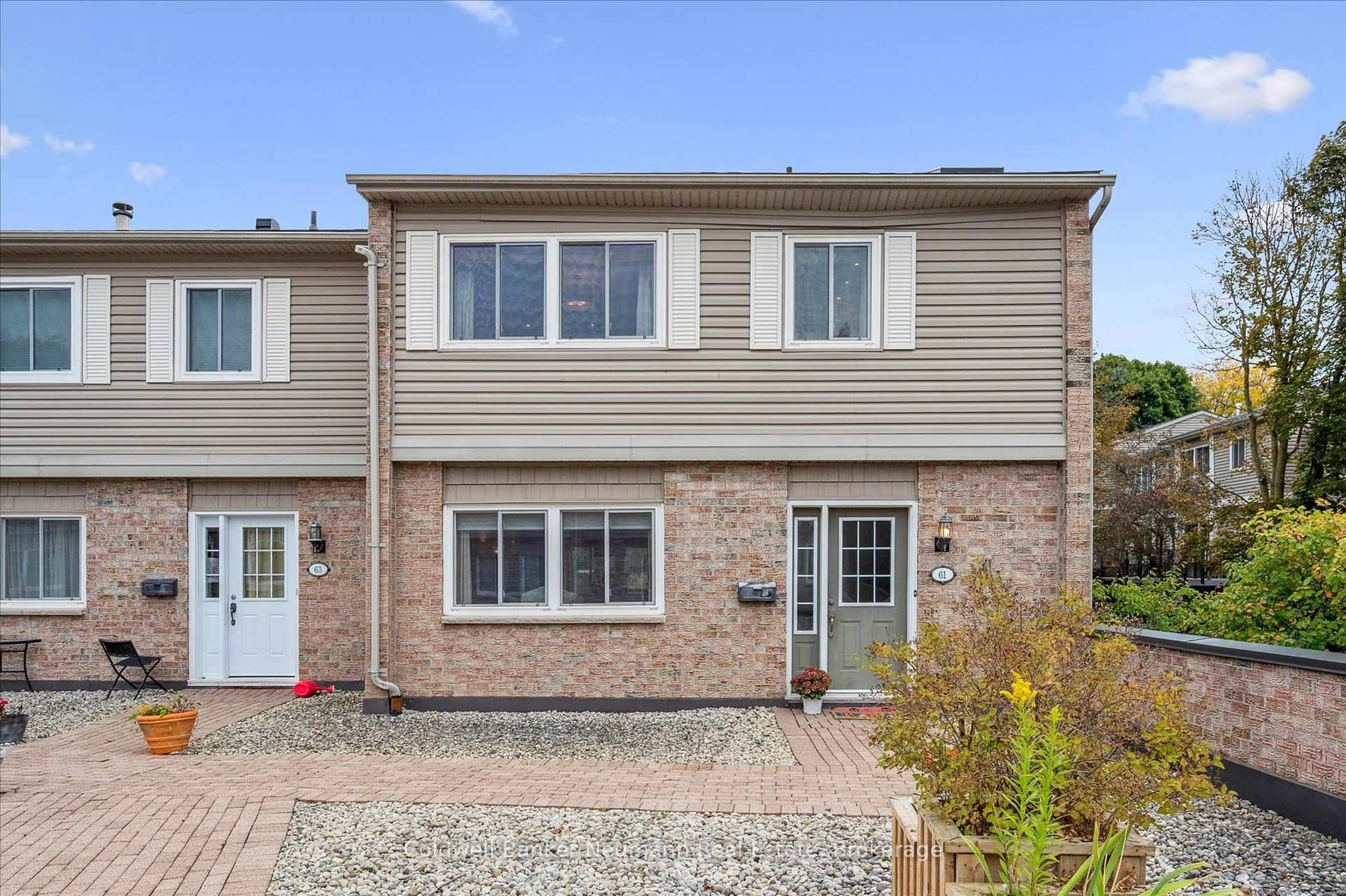 Home with brick exterior material, street for 295 Water St #61, Guelph Ontario N1G 2X5