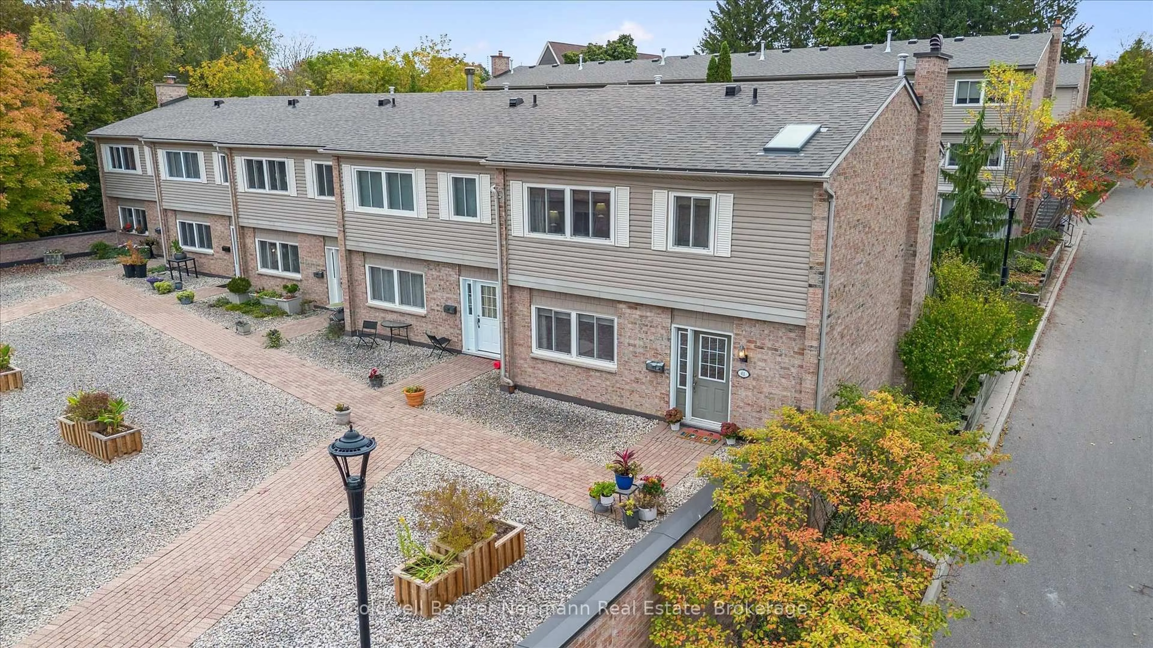 A pic from outside/outdoor area/front of a property/back of a property/a pic from drone, street for 295 Water St #61, Guelph Ontario N1G 2X5