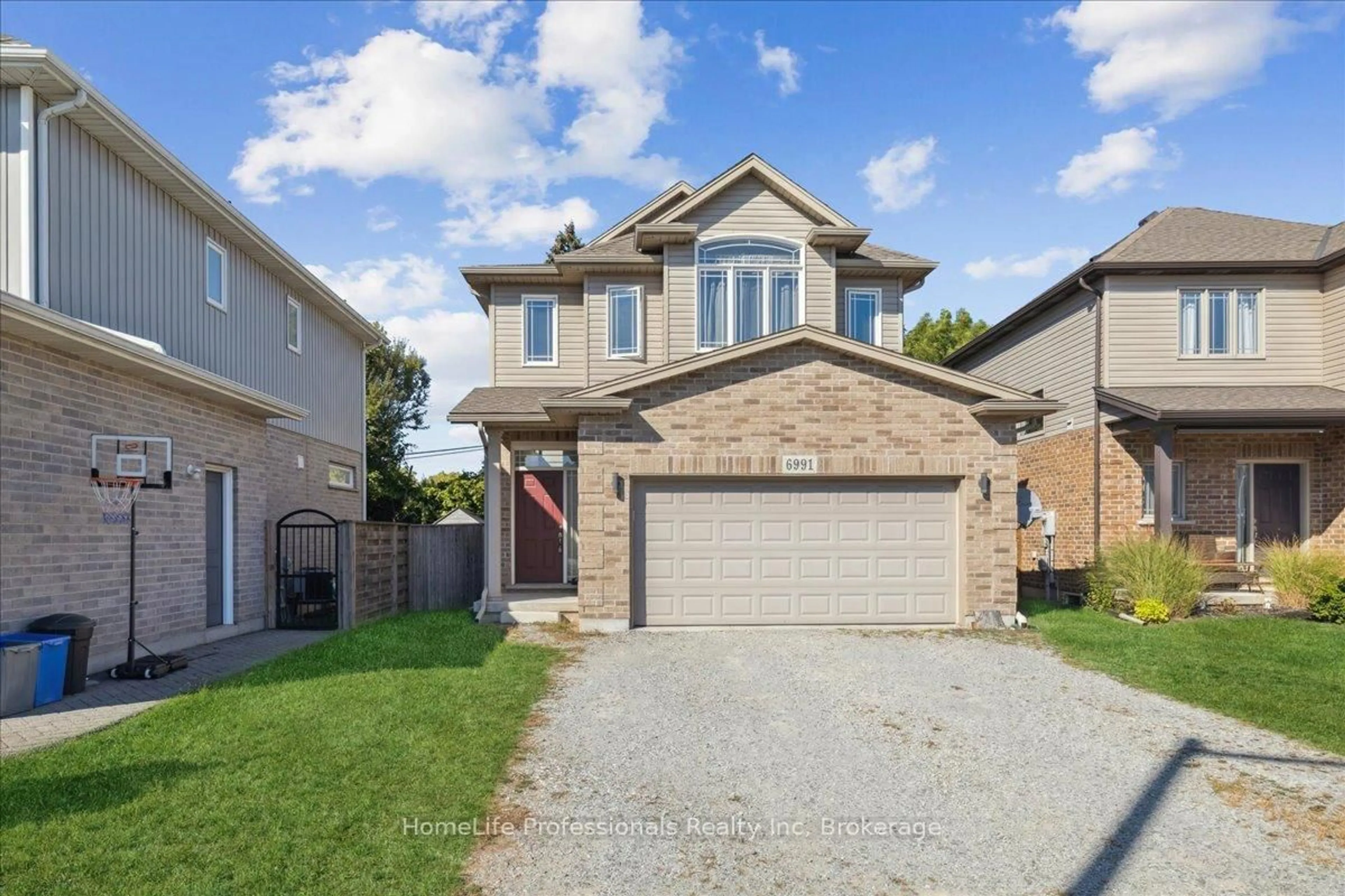 Home with brick exterior material, street for 6991 Optimist Lane, Niagara Falls Ontario L2E 0B1