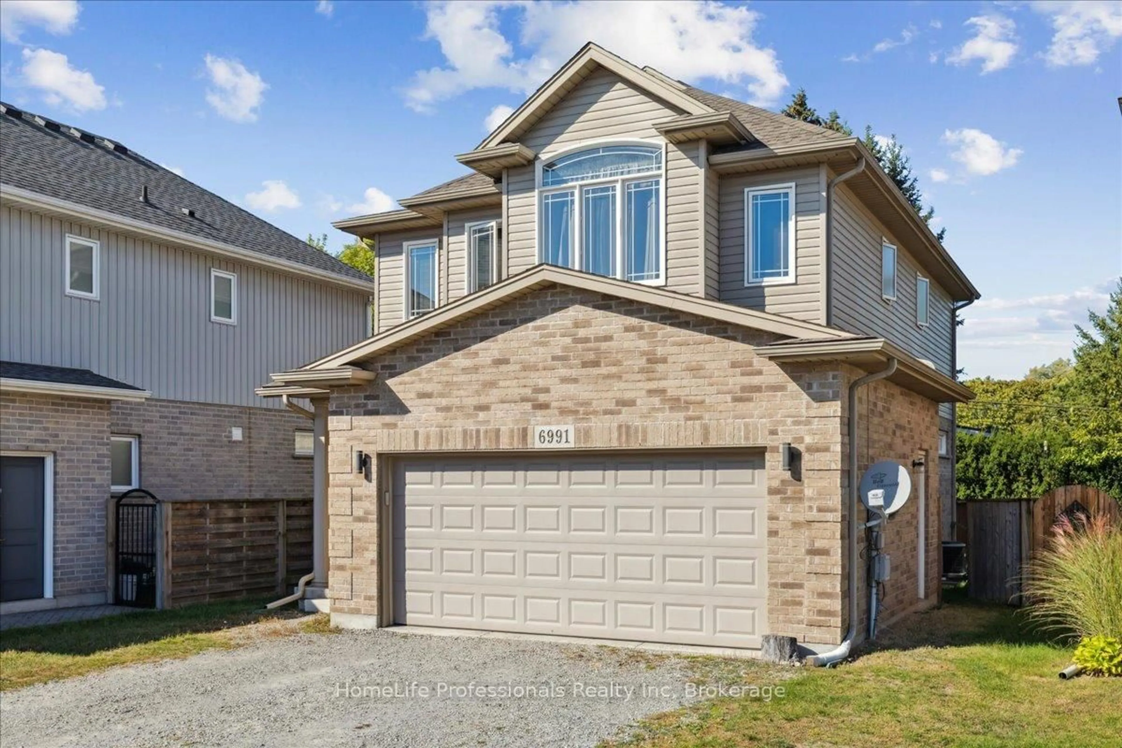 Home with brick exterior material, street for 6991 Optimist Lane, Niagara Falls Ontario L2E 0B1