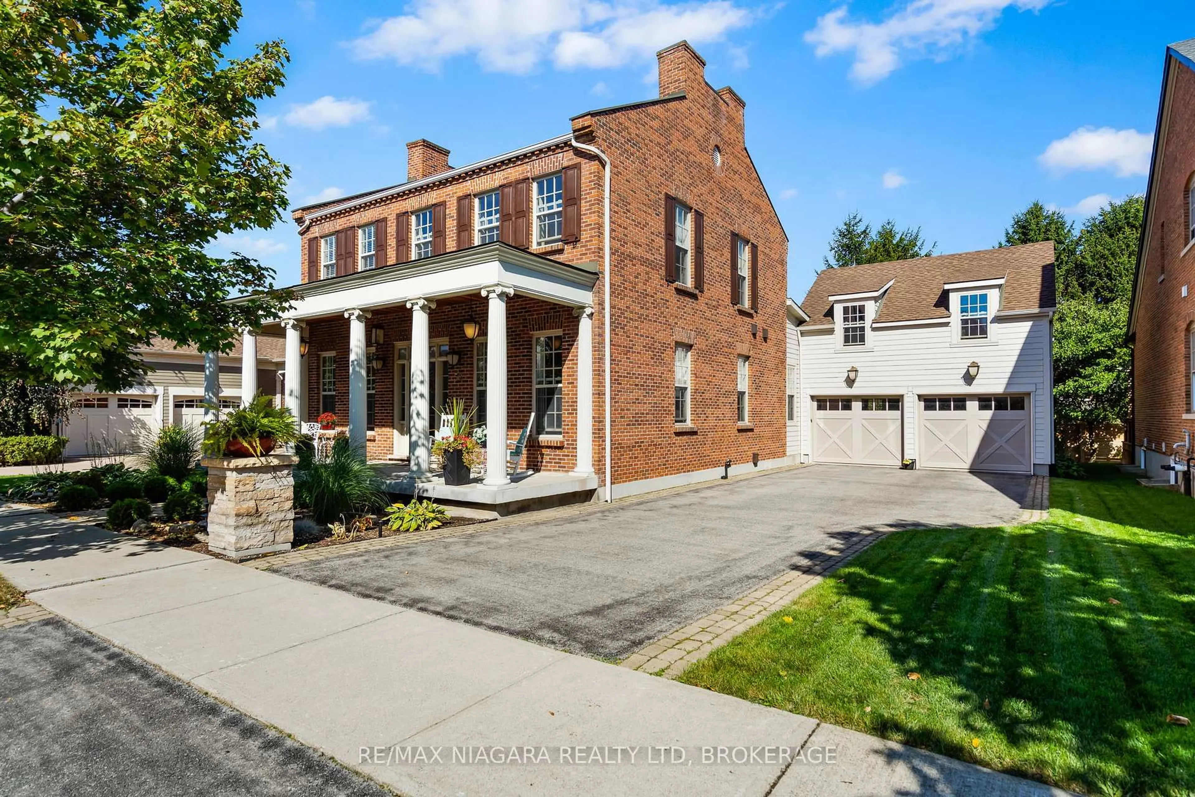Home with brick exterior material, street for 52 Garrison Village Dr, Niagara-on-the-Lake Ontario L0S 1J0
