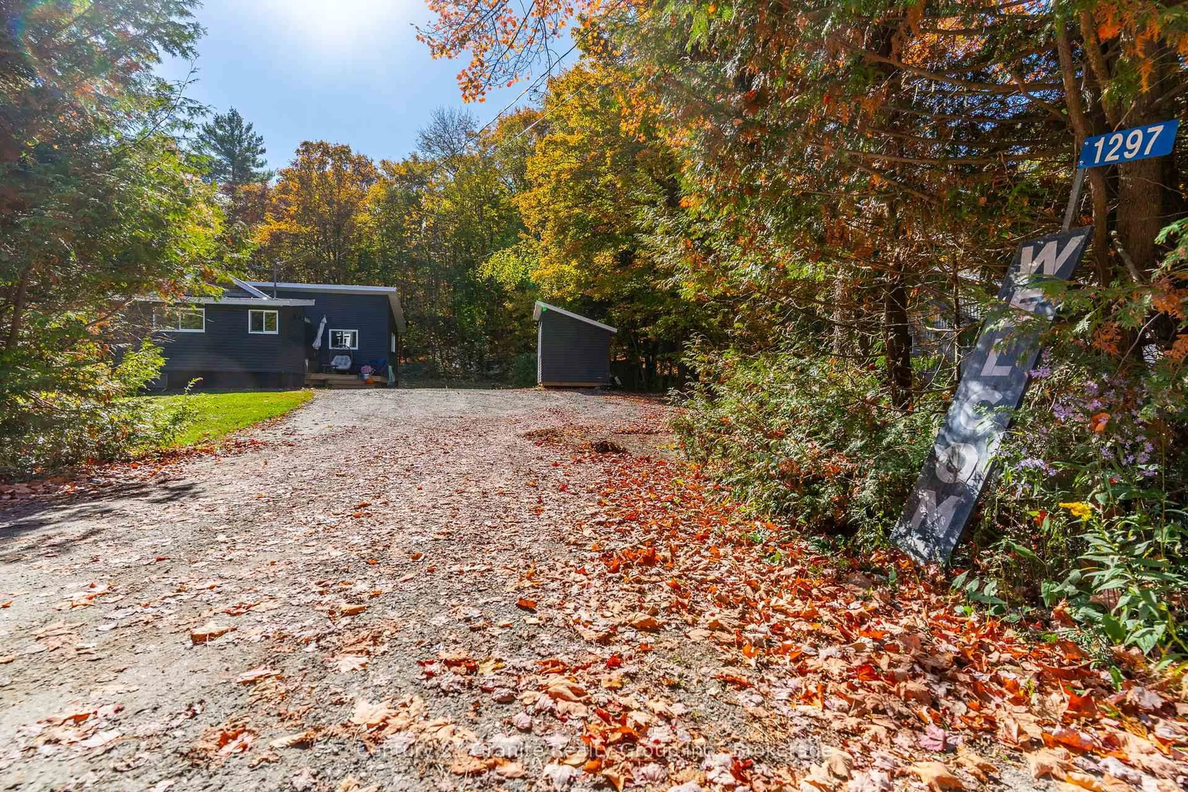 A pic from outside/outdoor area/front of a property/back of a property/a pic from drone, street for 1297 Hamilton Rd, Minden Hills Ontario K0M 2K0