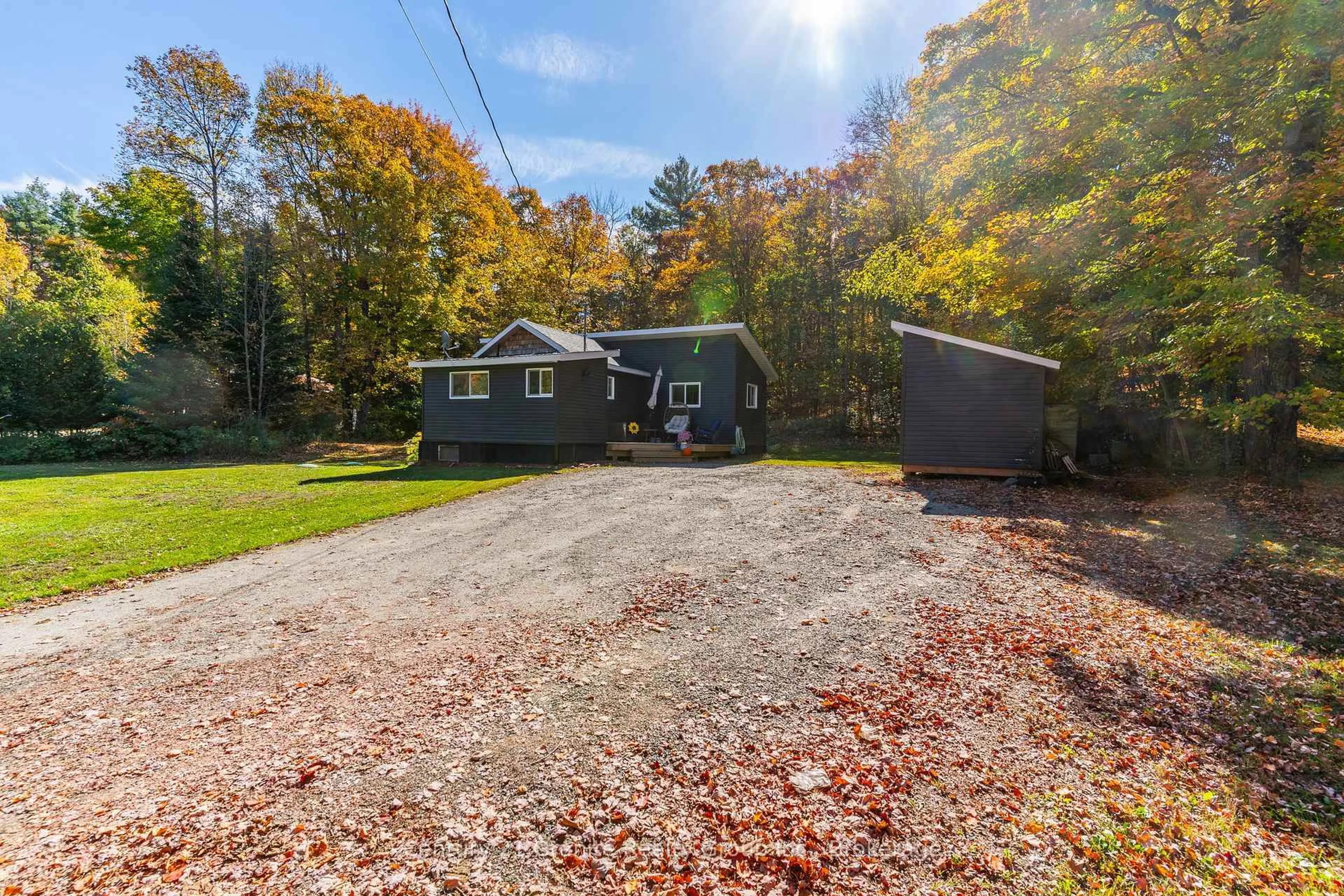 A pic from outside/outdoor area/front of a property/back of a property/a pic from drone, unknown for 1297 Hamilton Rd, Minden Hills Ontario K0M 2K0
