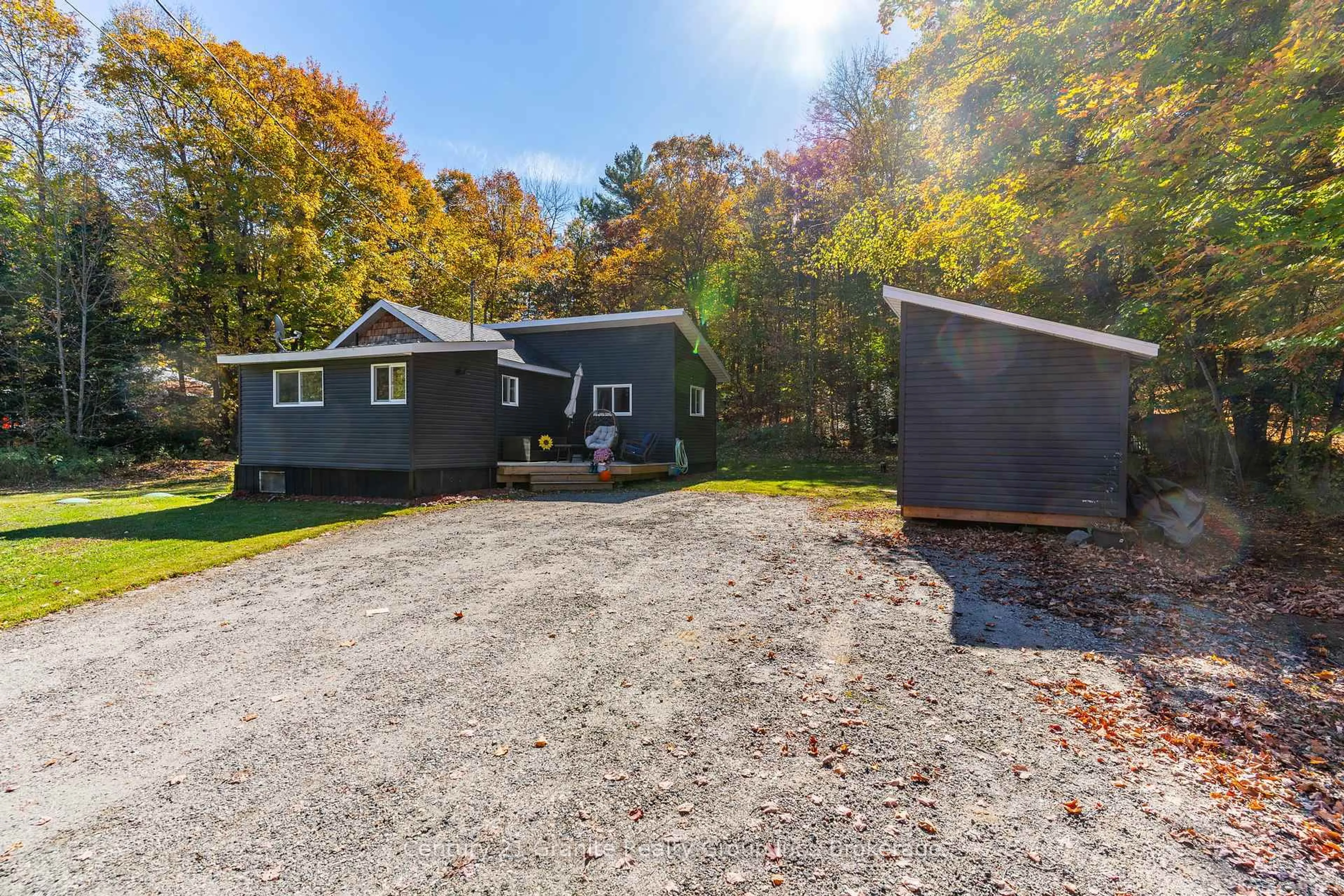 A pic from outside/outdoor area/front of a property/back of a property/a pic from drone, unknown for 1297 Hamilton Rd, Minden Hills Ontario K0M 2K0