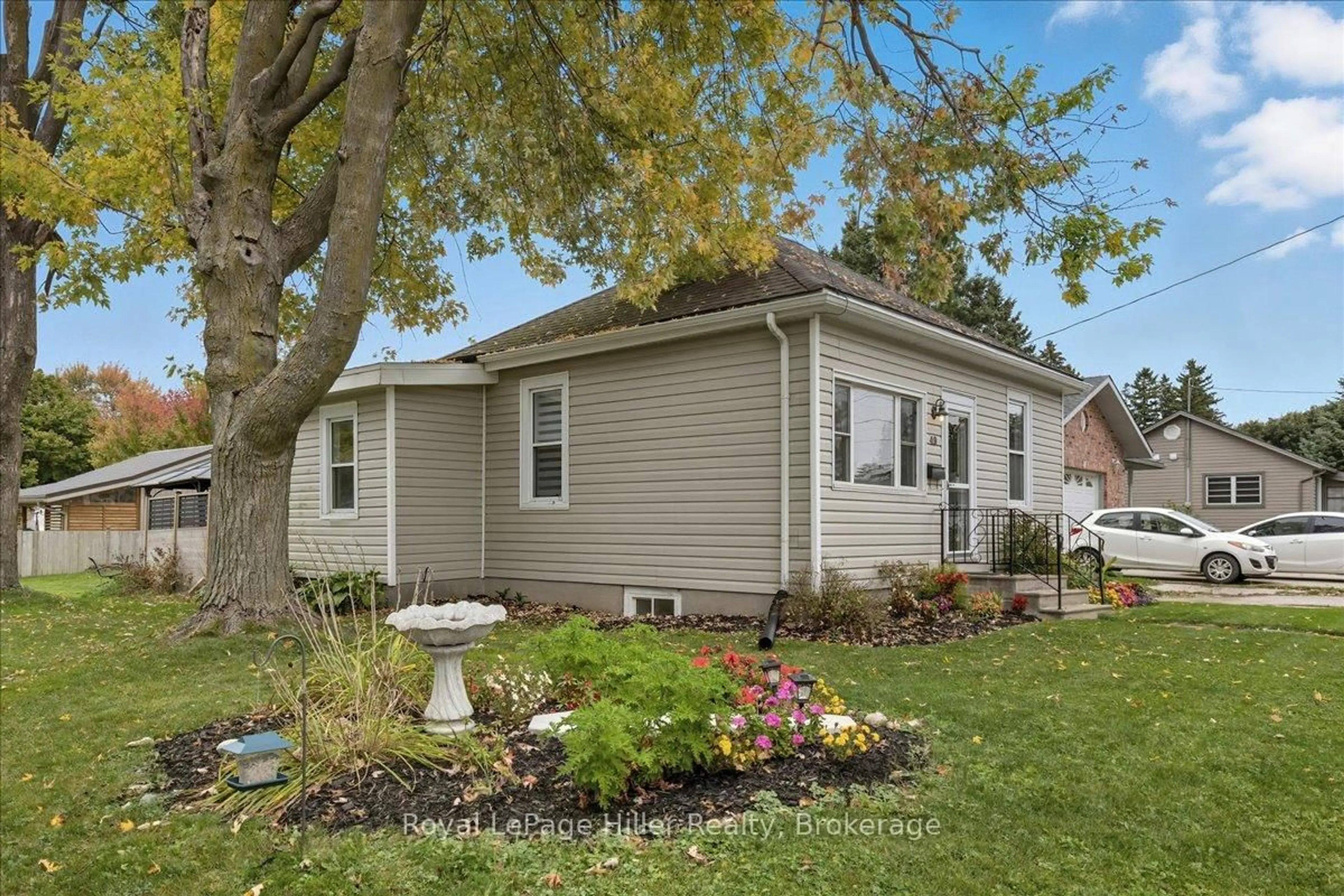 Home with vinyl exterior material, street for 49 Marlborough St, West Perth Ontario N0K 1N0