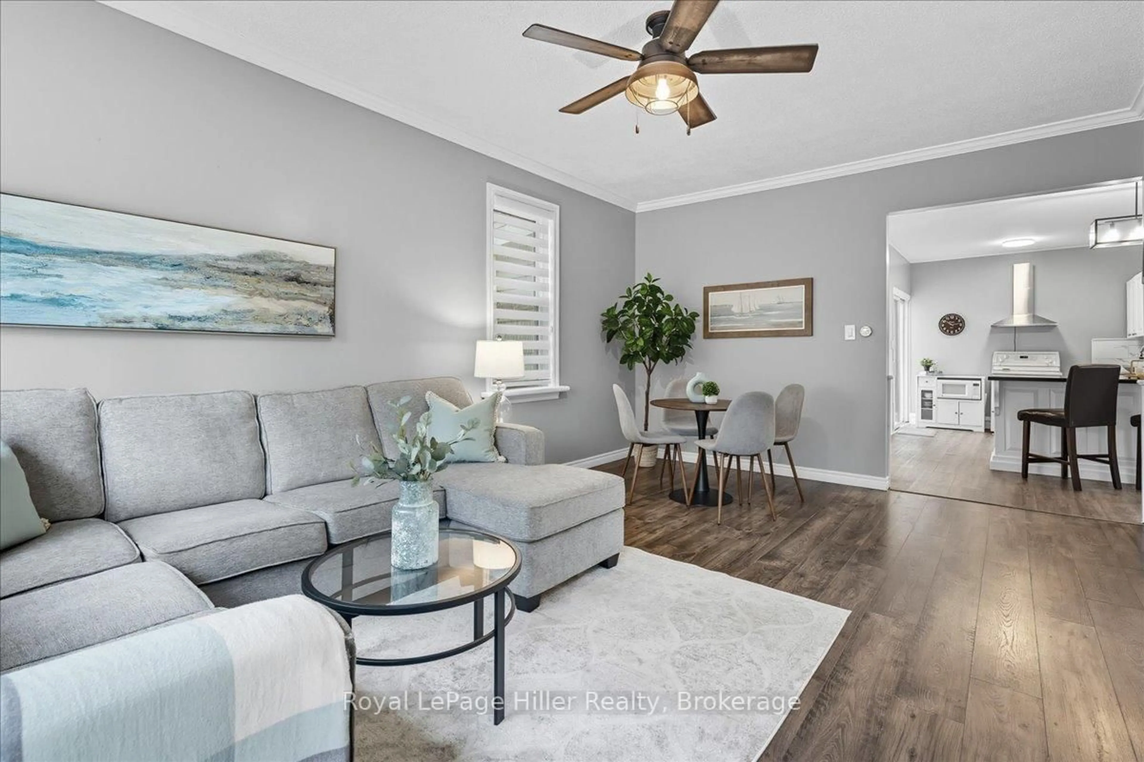 Living room with furniture, wood/laminate floor for 49 Marlborough St, West Perth Ontario N0K 1N0