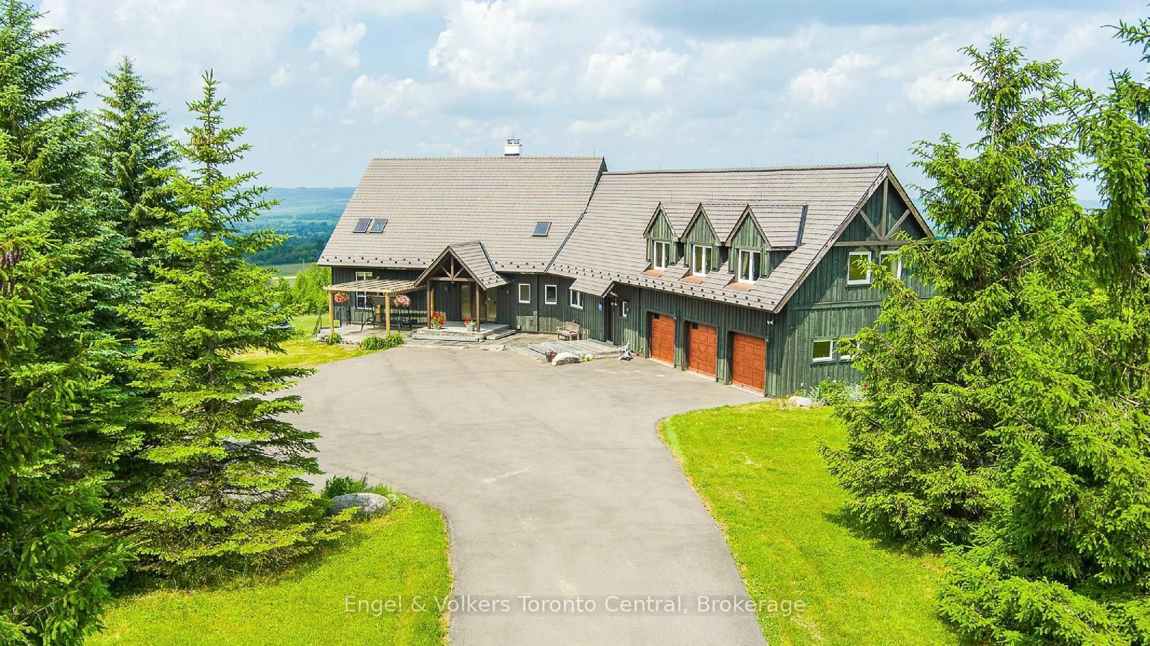A pic from outside/outdoor area/front of a property/back of a property/a pic from drone, mountain view for 496083 Grey Road 2 Rd, Blue Mountains Ontario N0H 1J0