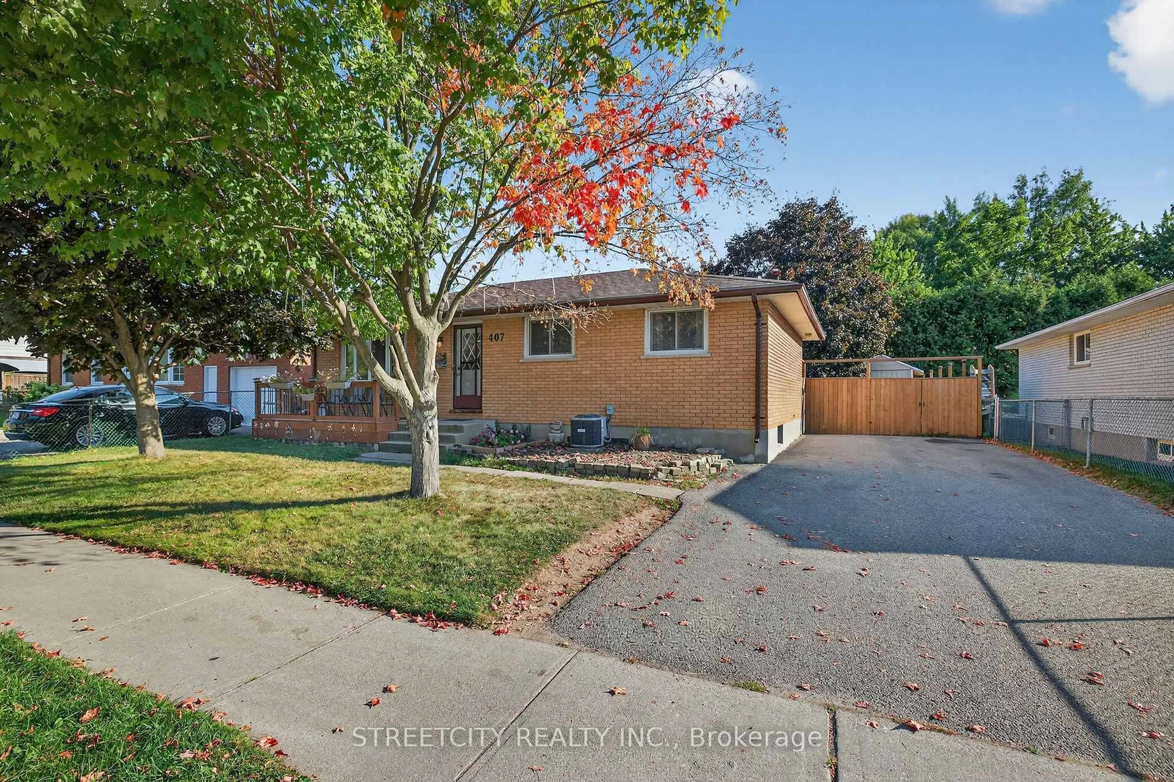 Home with brick exterior material, street for 407 Elm St, St. Thomas Ontario N5R 1K2