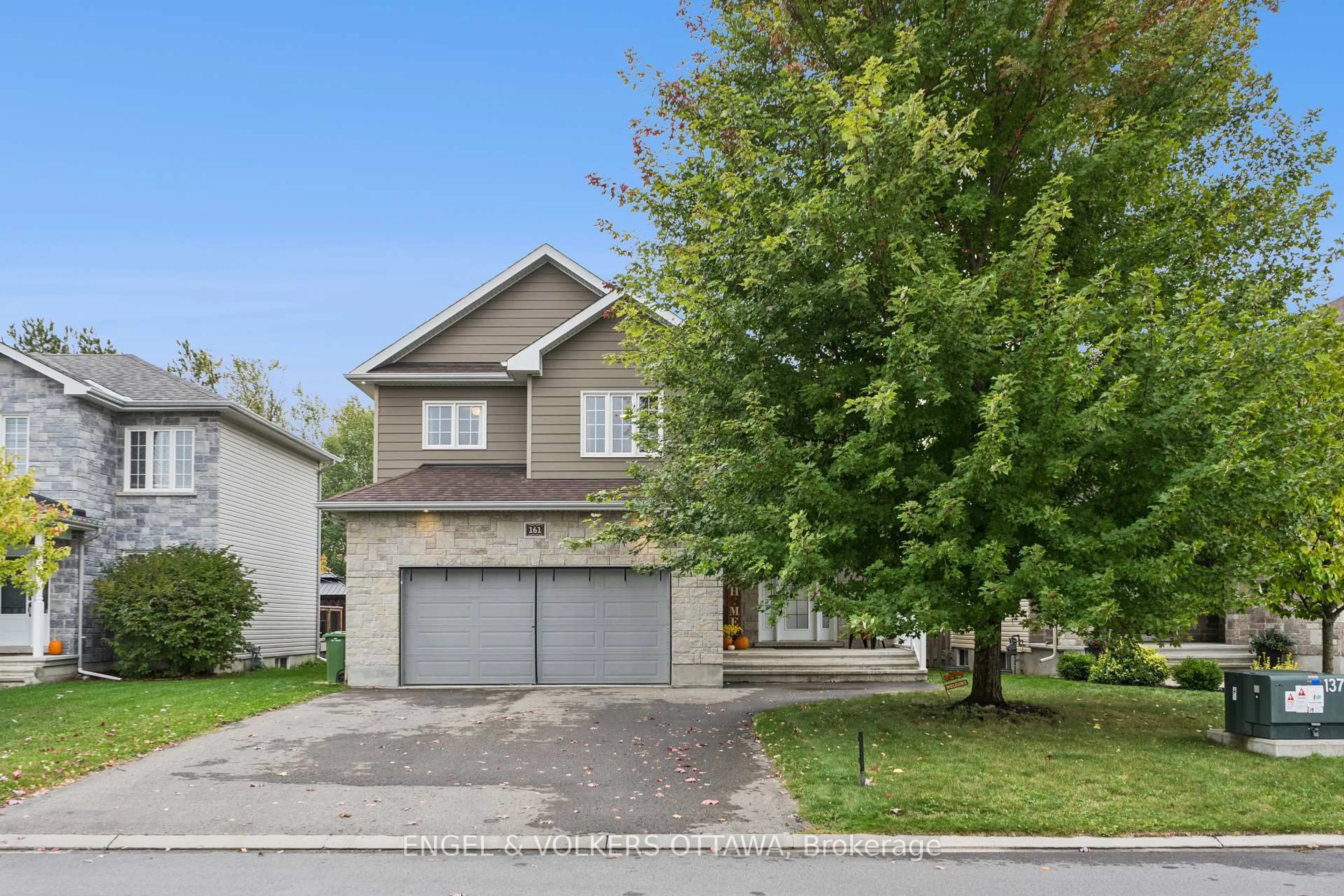 Home with vinyl exterior material, street for 161 Des Pins St, Russell Ontario K4R 0B9