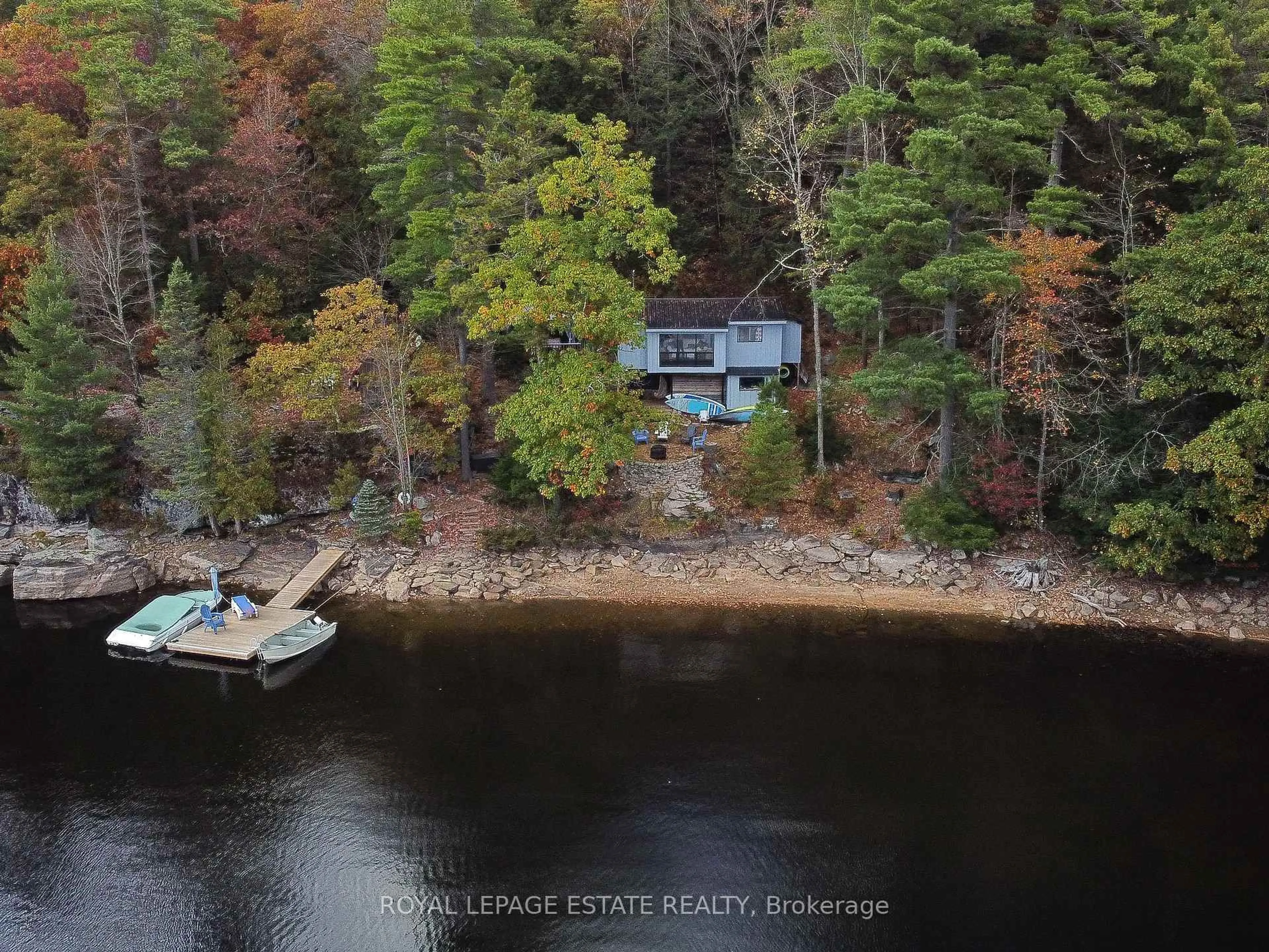 A pic from outside/outdoor area/front of a property/back of a property/a pic from drone, water/lake/river/ocean view for 329 Fire Route 247 Rd, North Kawartha Ontario K0L 1A0