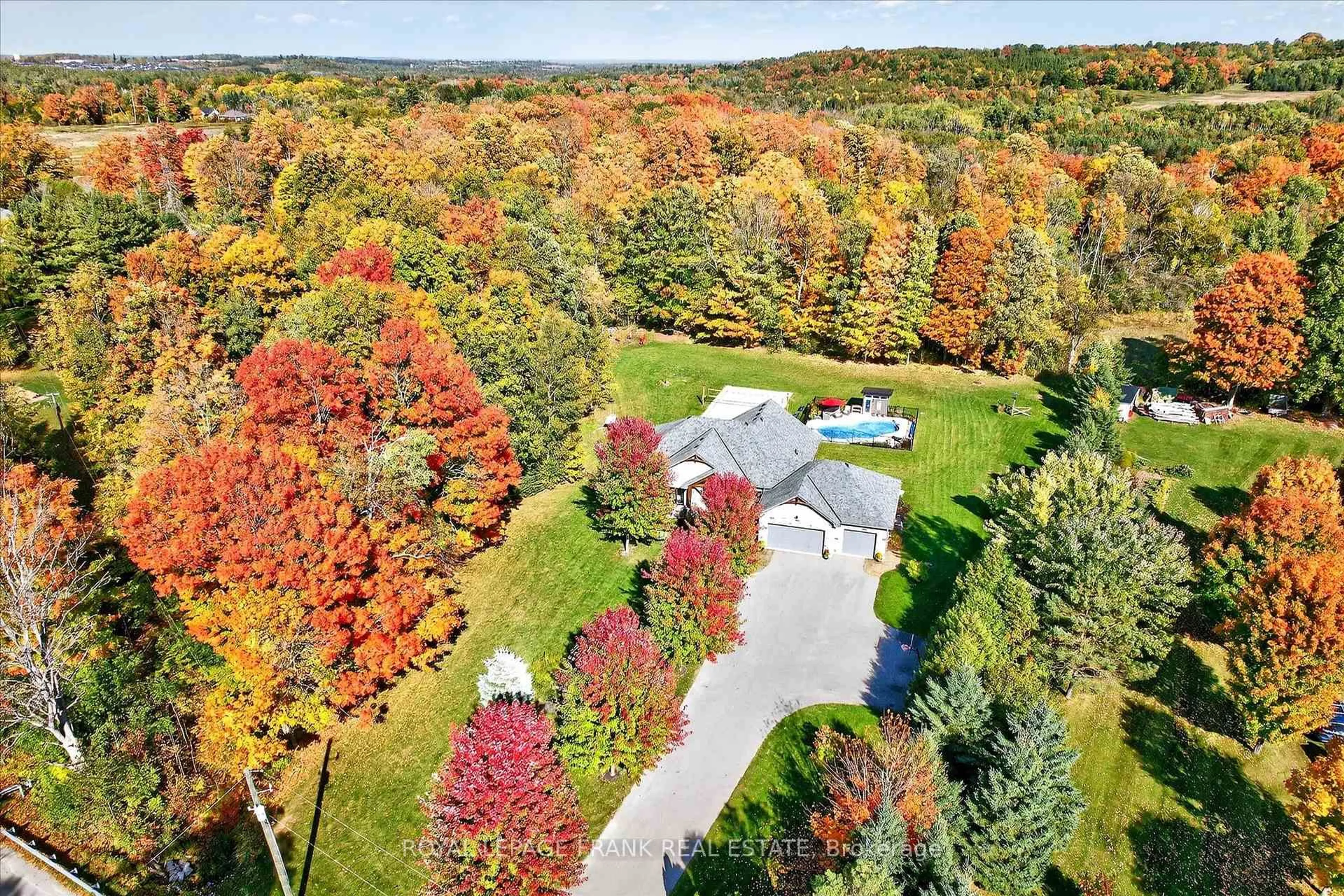 A pic from outside/outdoor area/front of a property/back of a property/a pic from drone, forest/trees view for 633 Carveth Dr, Cavan Monaghan Ontario L0A 1G0