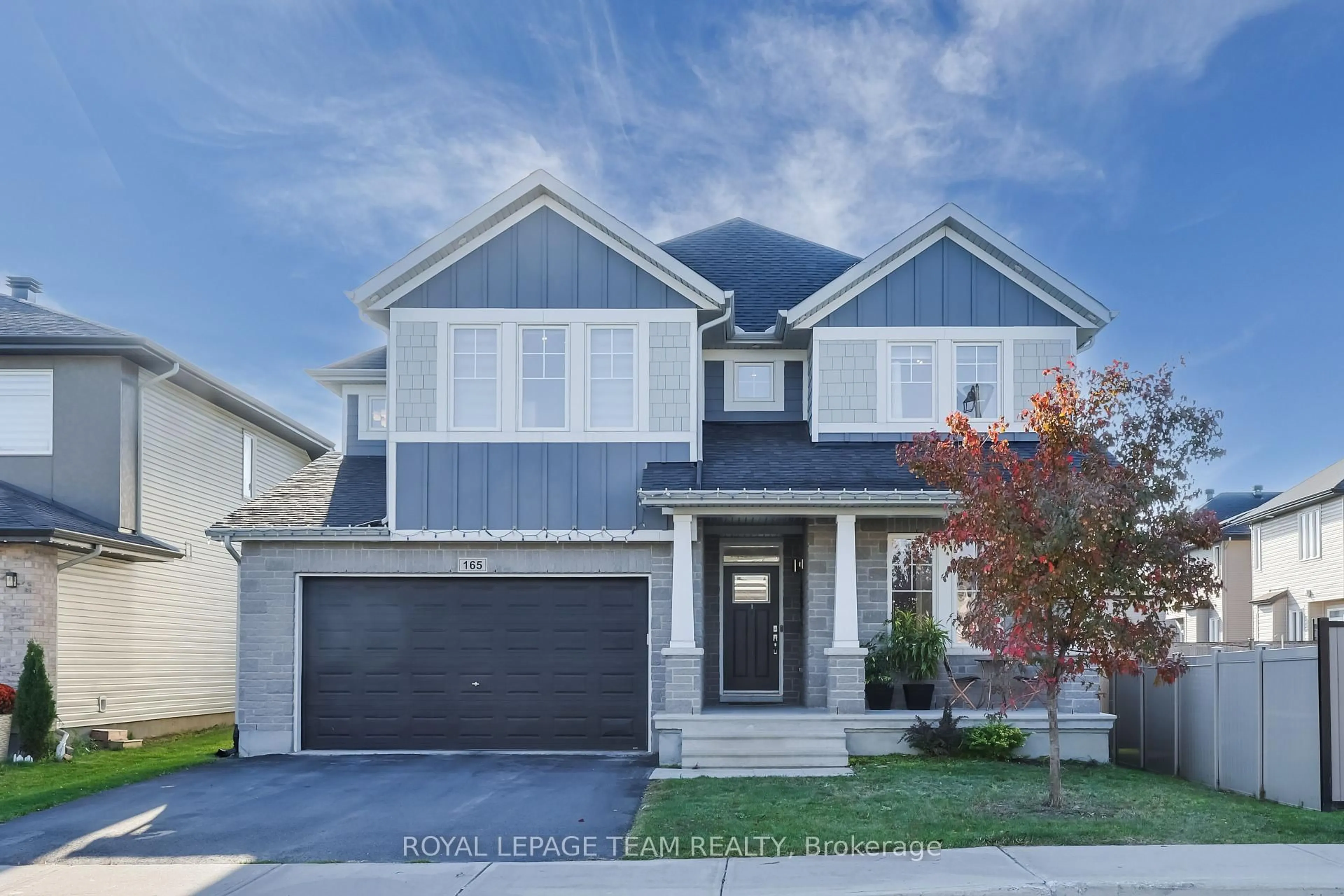 Home with vinyl exterior material, street for 165 Groningen St, Ottawa Ontario K2V 0C6