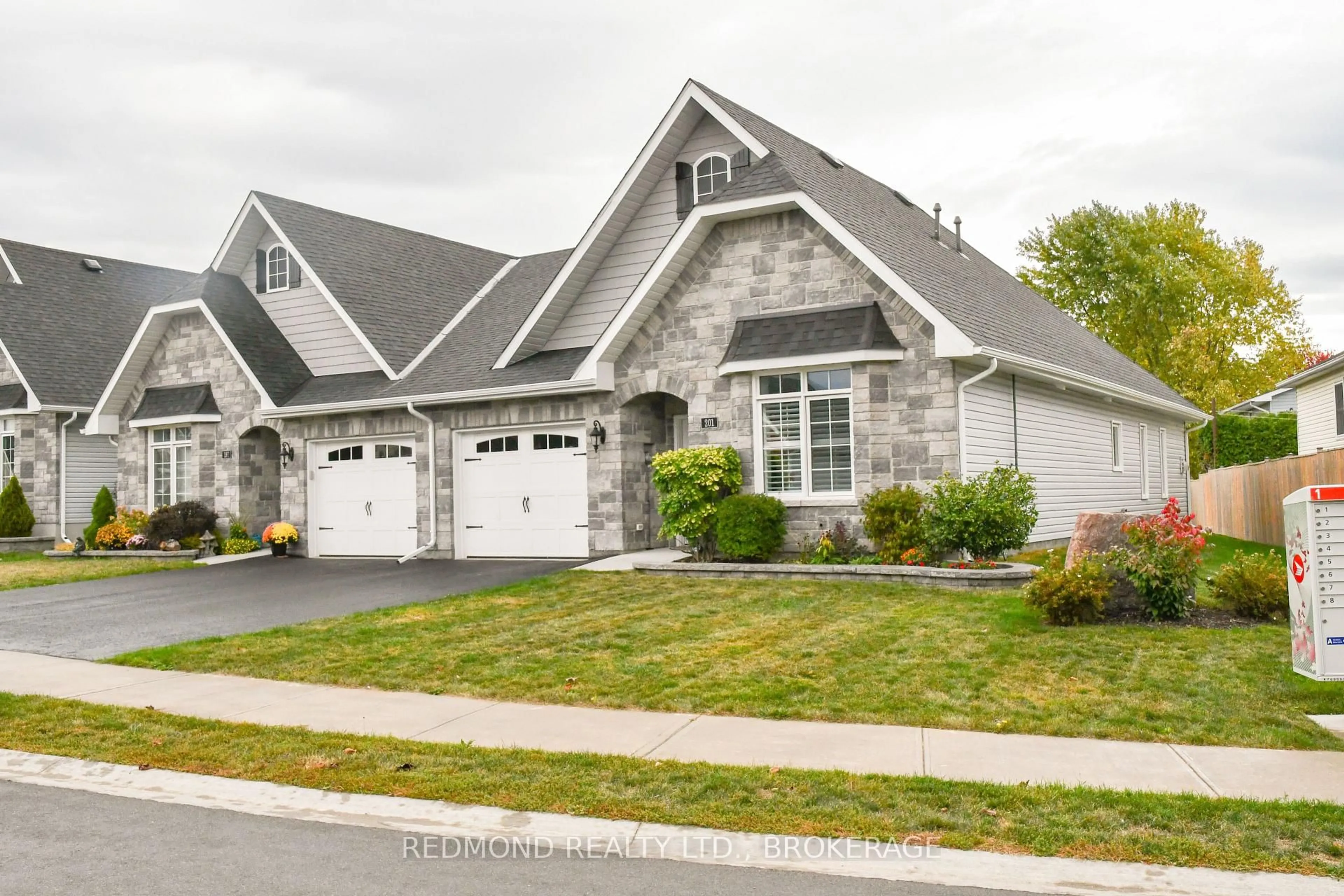 Home with vinyl exterior material, street for 201 Wilmer Ave, Gananoque Ontario K7G 3C3