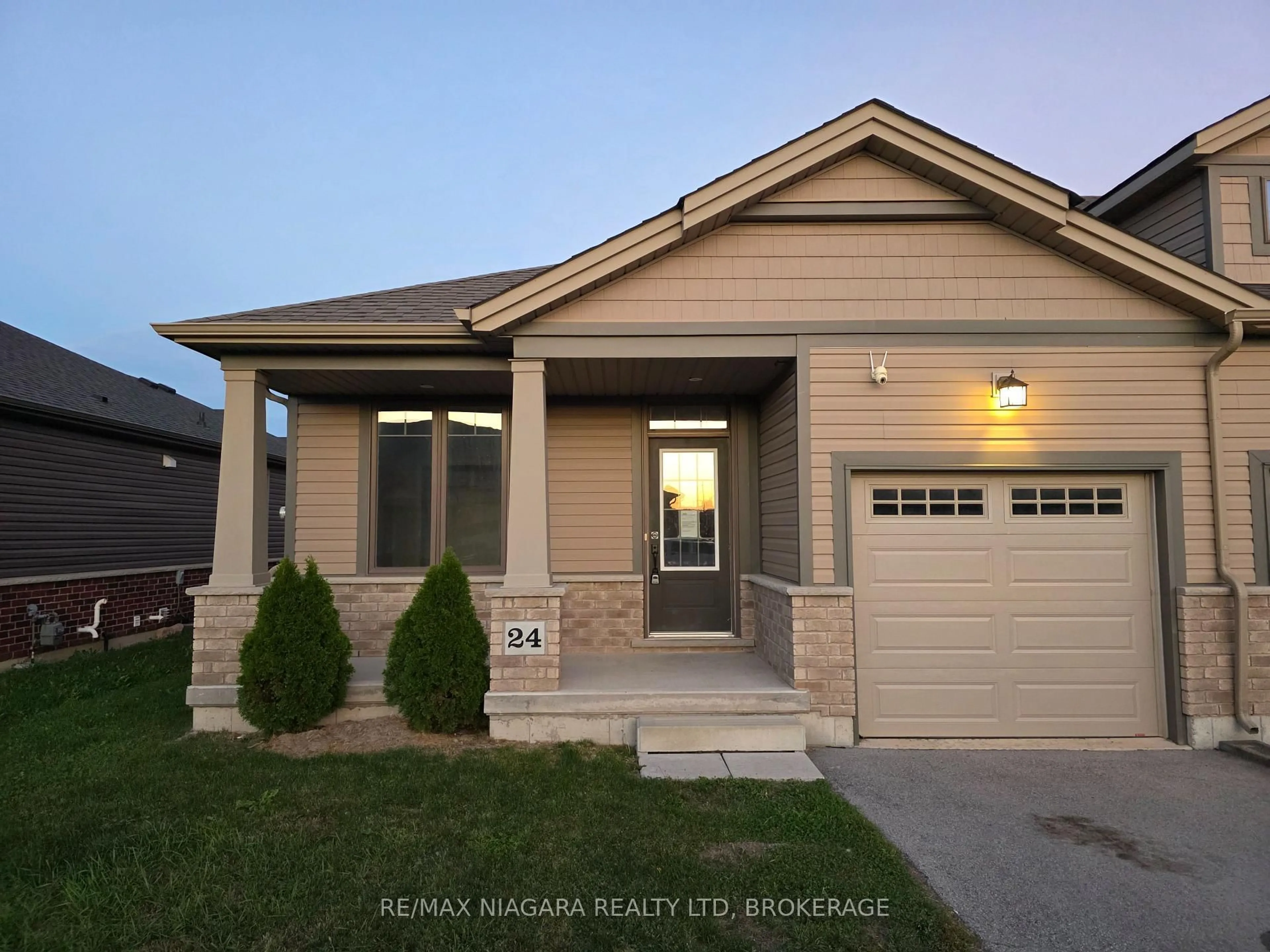 Home with vinyl exterior material, street for 24 Ellis Ave, St. Catharines Ontario L2P 0E6