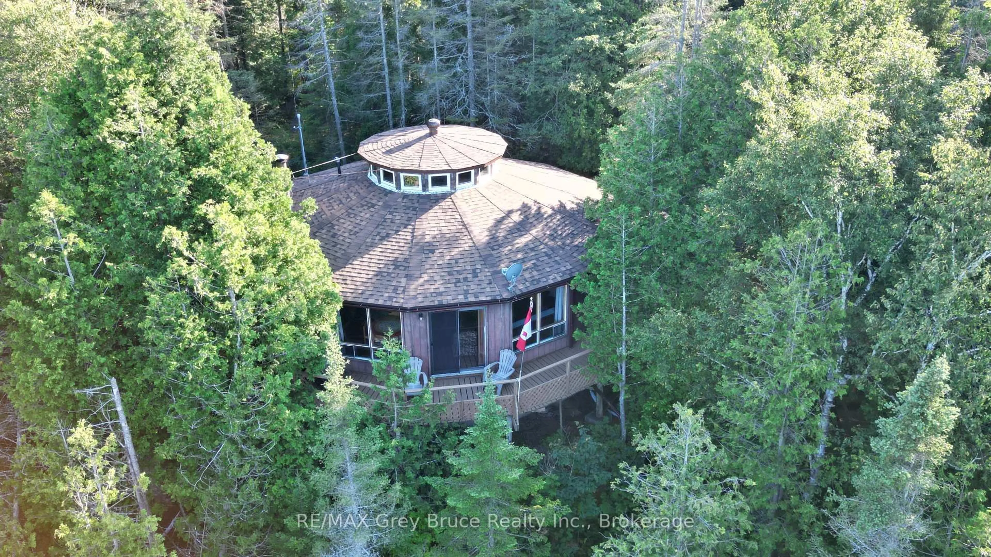 A pic from outside/outdoor area/front of a property/back of a property/a pic from drone, forest/trees view for 8 CARTER Rd, Northern Bruce Peninsula Ontario N0H 1W0