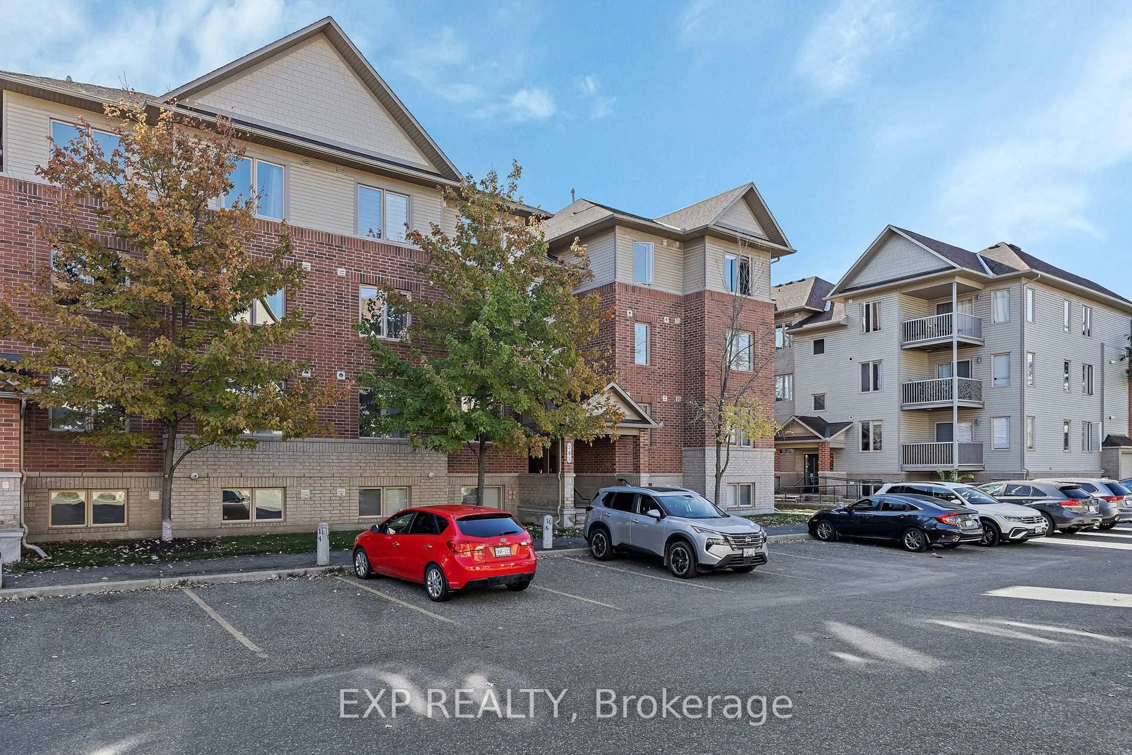 A pic from outside/outdoor area/front of a property/back of a property/a pic from drone, unknown for 585 Stonefield Private #6, Ottawa Ontario K2G 4R4