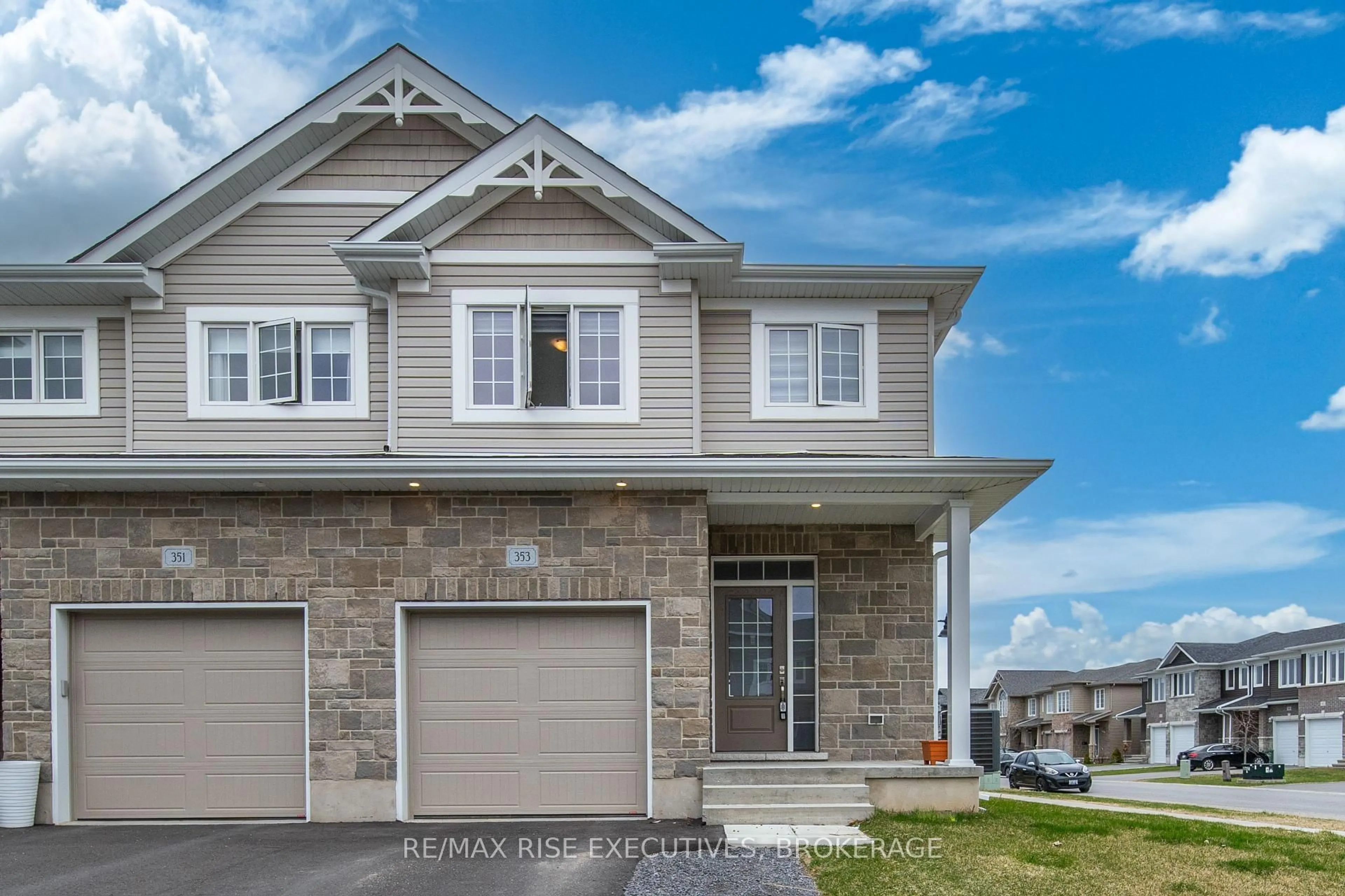 Home with vinyl exterior material, street for 353 Buckthorn Dr, Kingston Ontario K7P 0S1