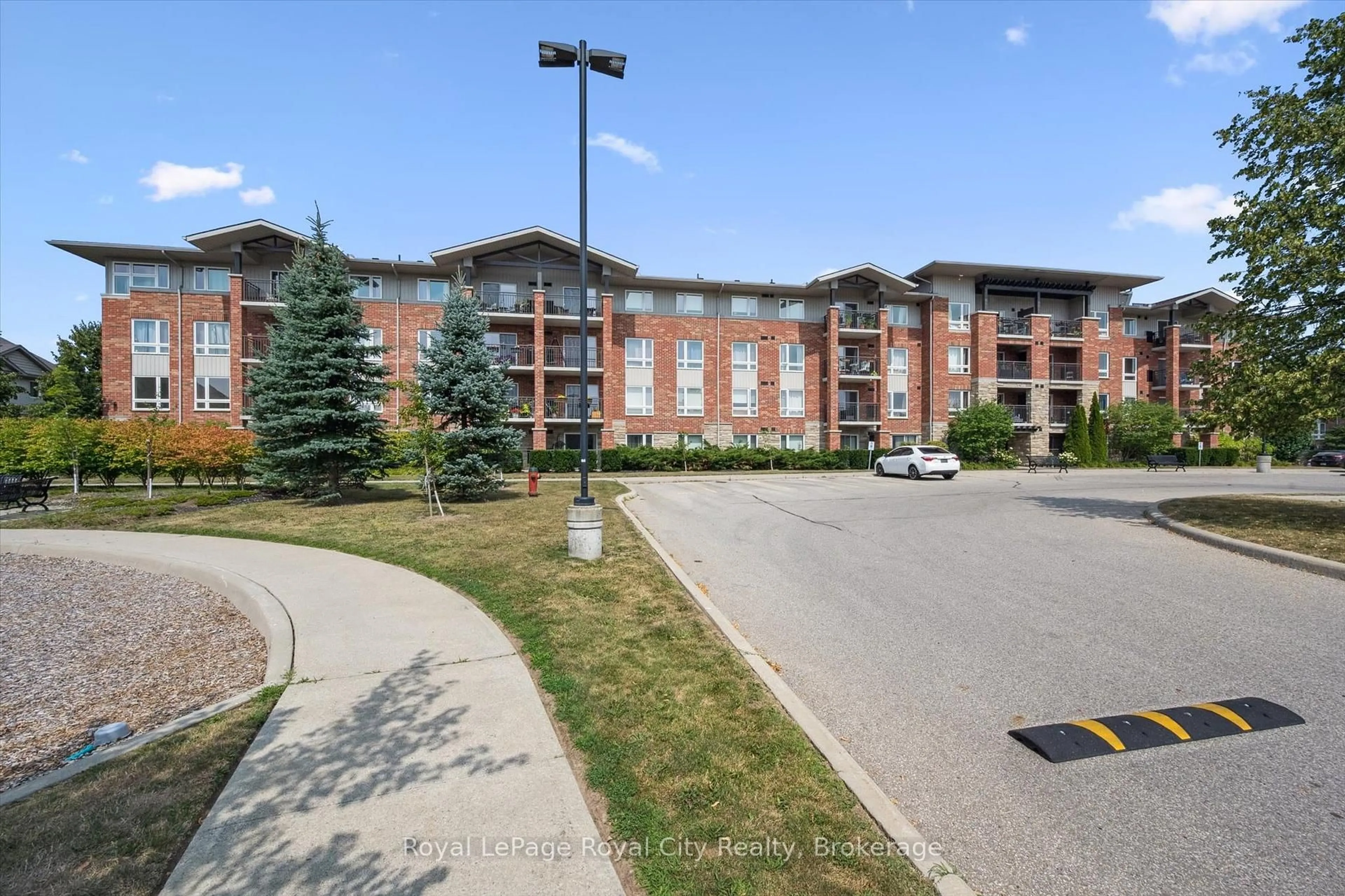 A pic from outside/outdoor area/front of a property/back of a property/a pic from drone, unknown for 60 Lynnmore St #313, Guelph Ontario N1L 0J8