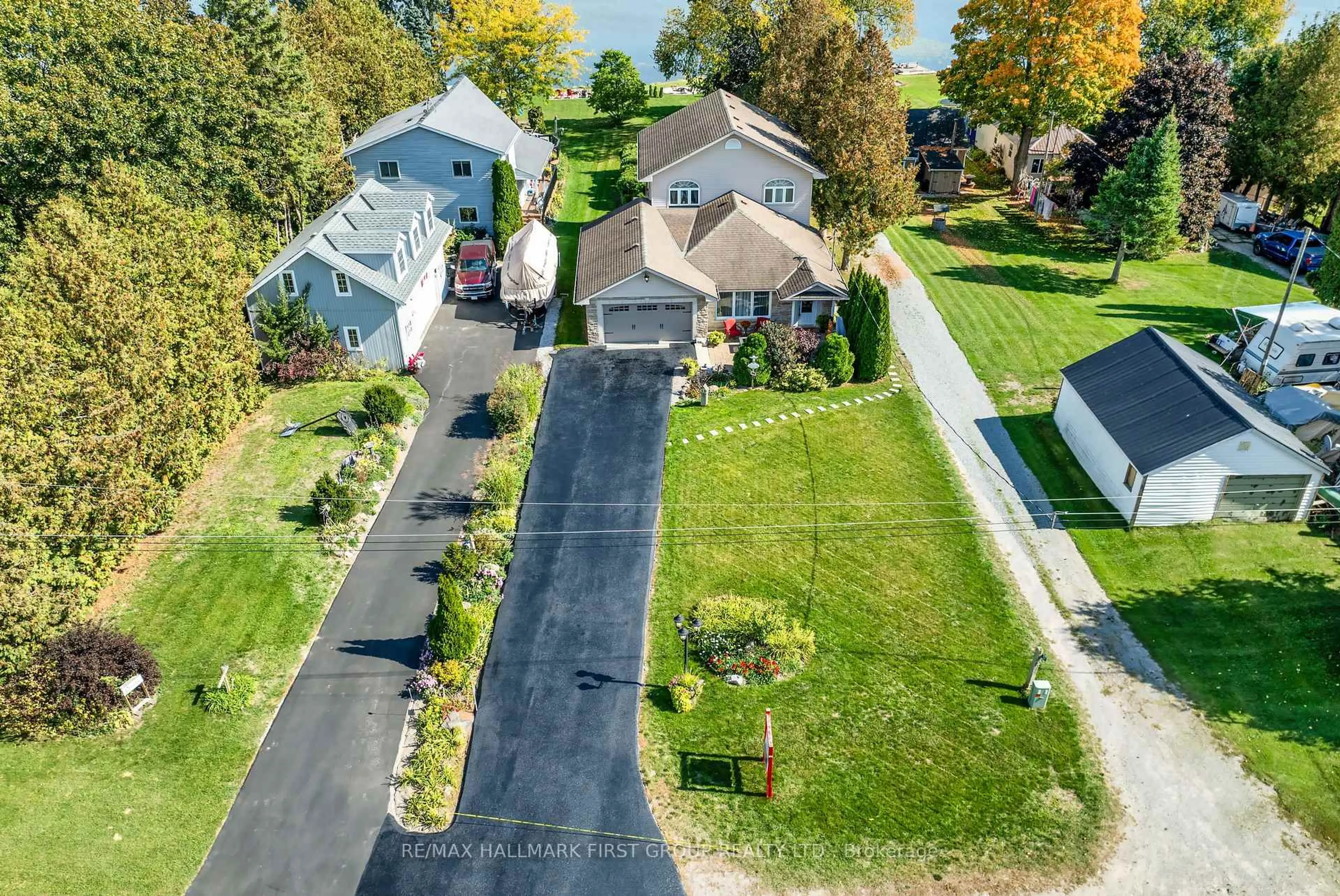 A pic from outside/outdoor area/front of a property/back of a property/a pic from drone, water/lake/river/ocean view for 61 Druan Dr, Kawartha Lakes Ontario L0C 1G0