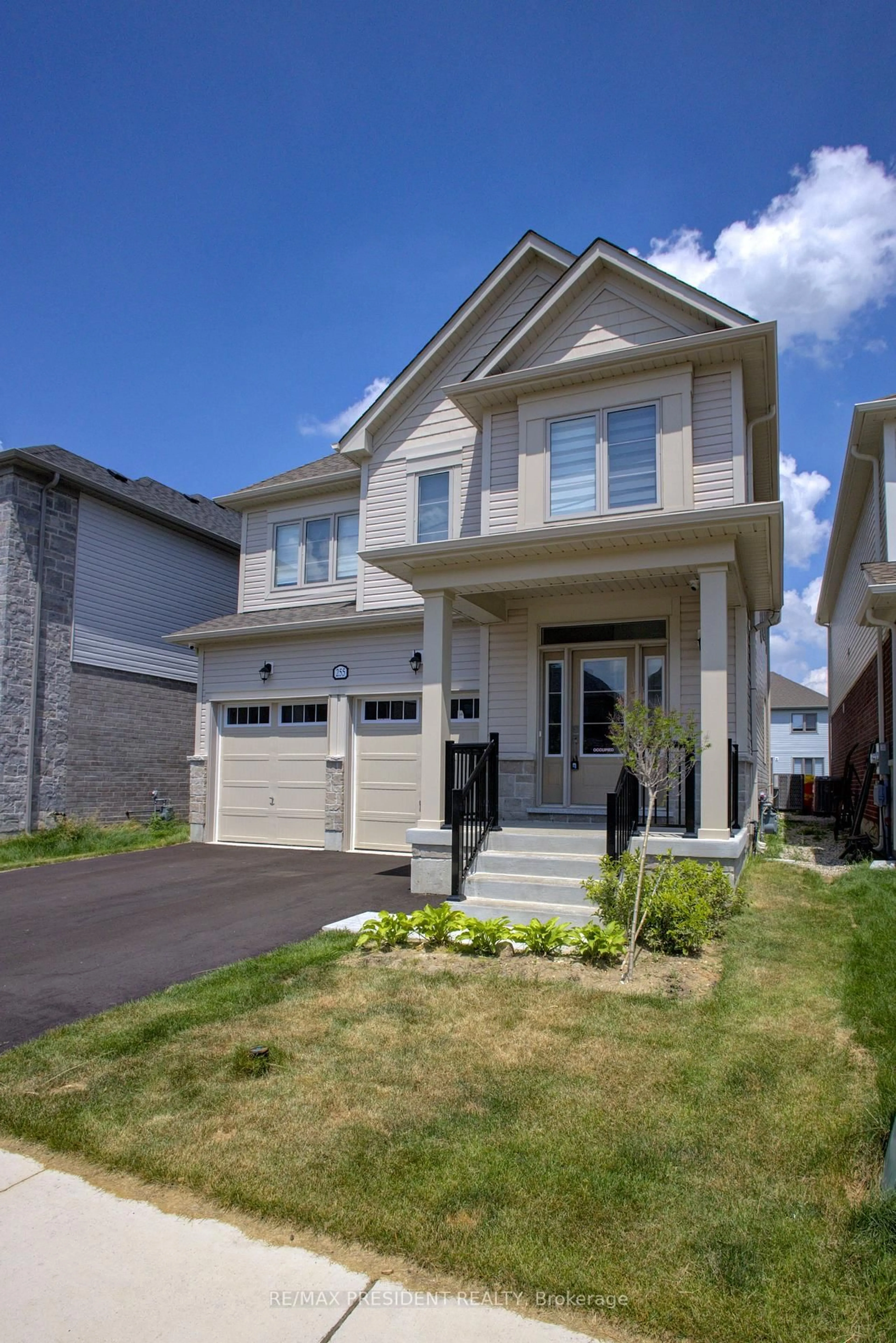 Home with vinyl exterior material, street for 255 Rea Dr, Centre Wellington Ontario N1M 0K1
