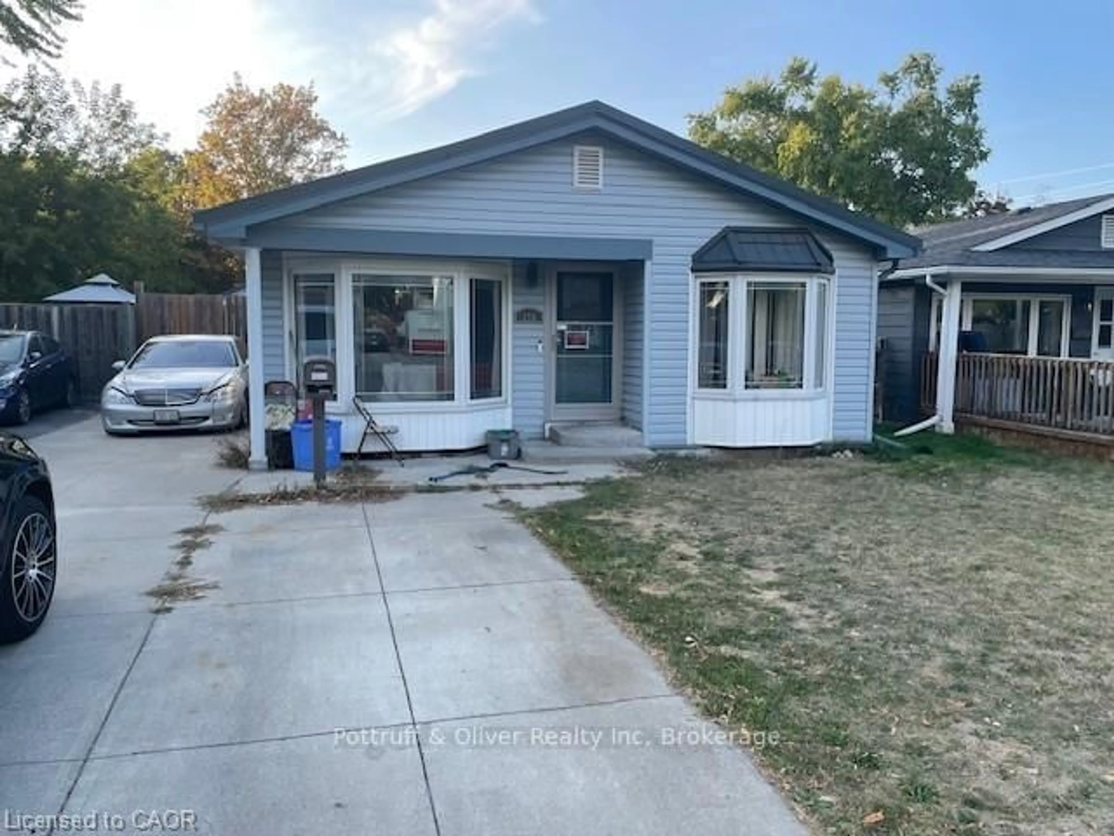Home with vinyl exterior material, street for 156 Traynor Ave, Kitchener Ontario N2C 1W5