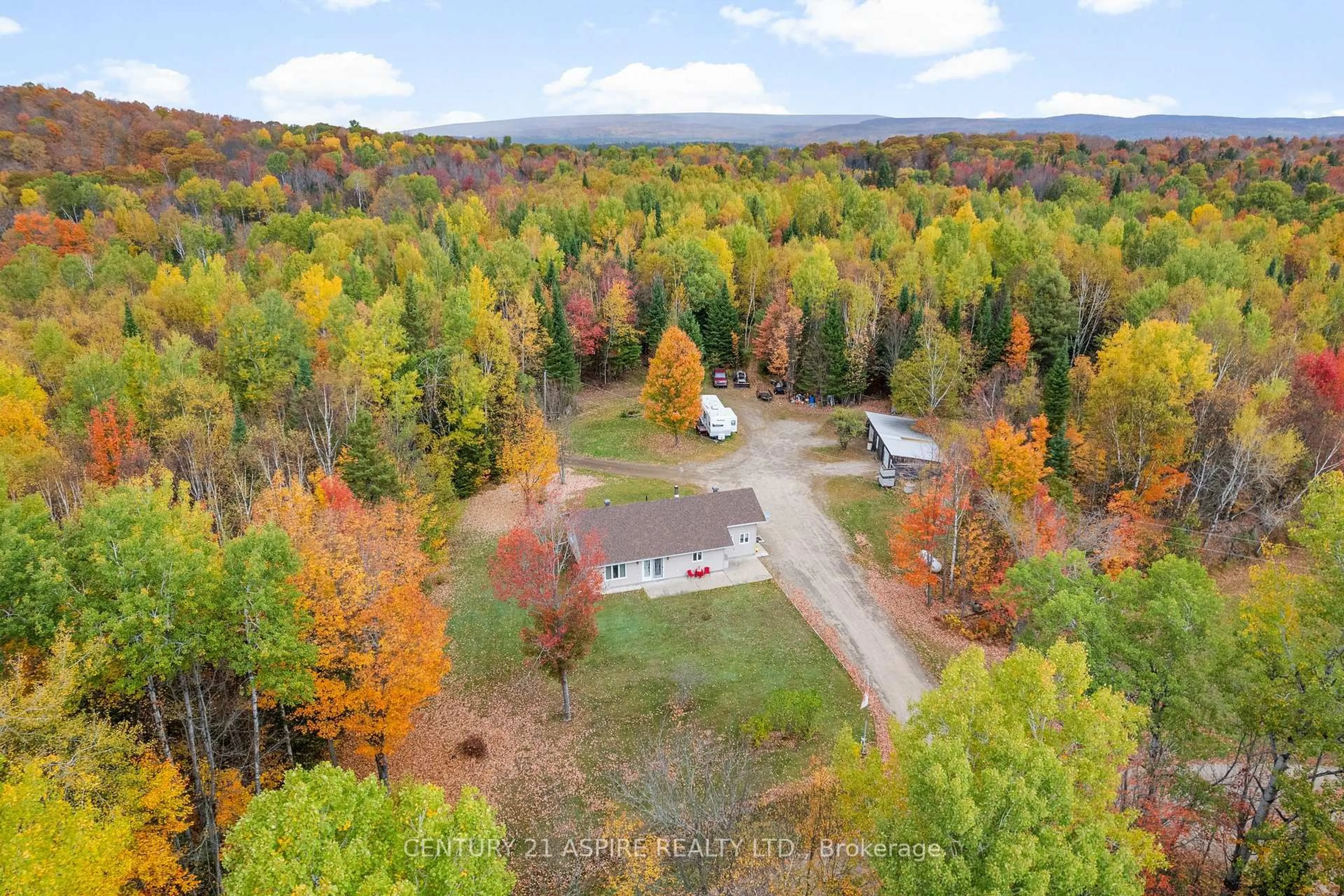 A pic from outside/outdoor area/front of a property/back of a property/a pic from drone, forest/trees view for 33 Micks Rd, Combermere Ontario K0J 1L0
