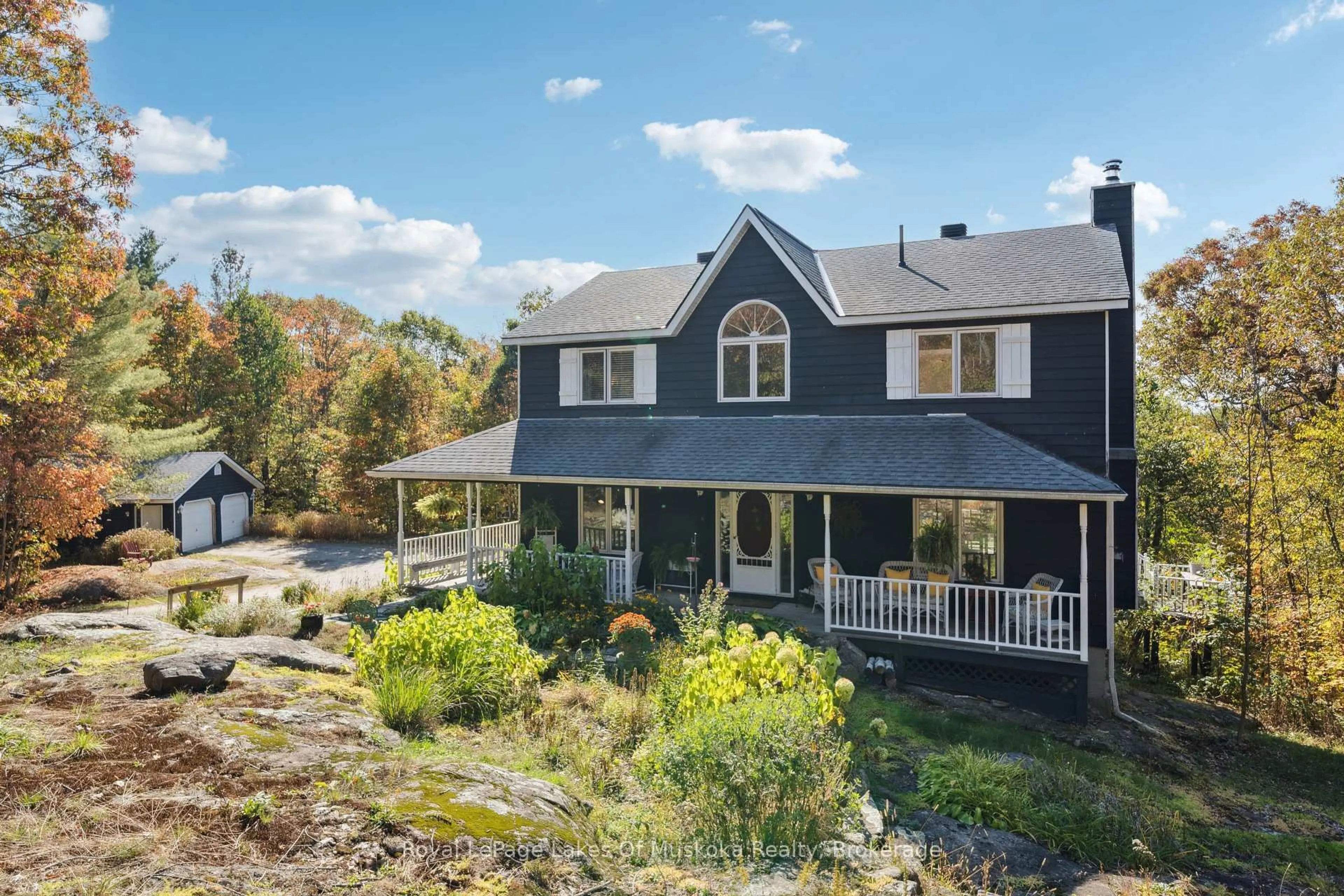 A pic from outside/outdoor area/front of a property/back of a property/a pic from drone, unknown for 1779 Muskoka Rd 118 Rd, Muskoka Lakes Ontario P1L 1W8