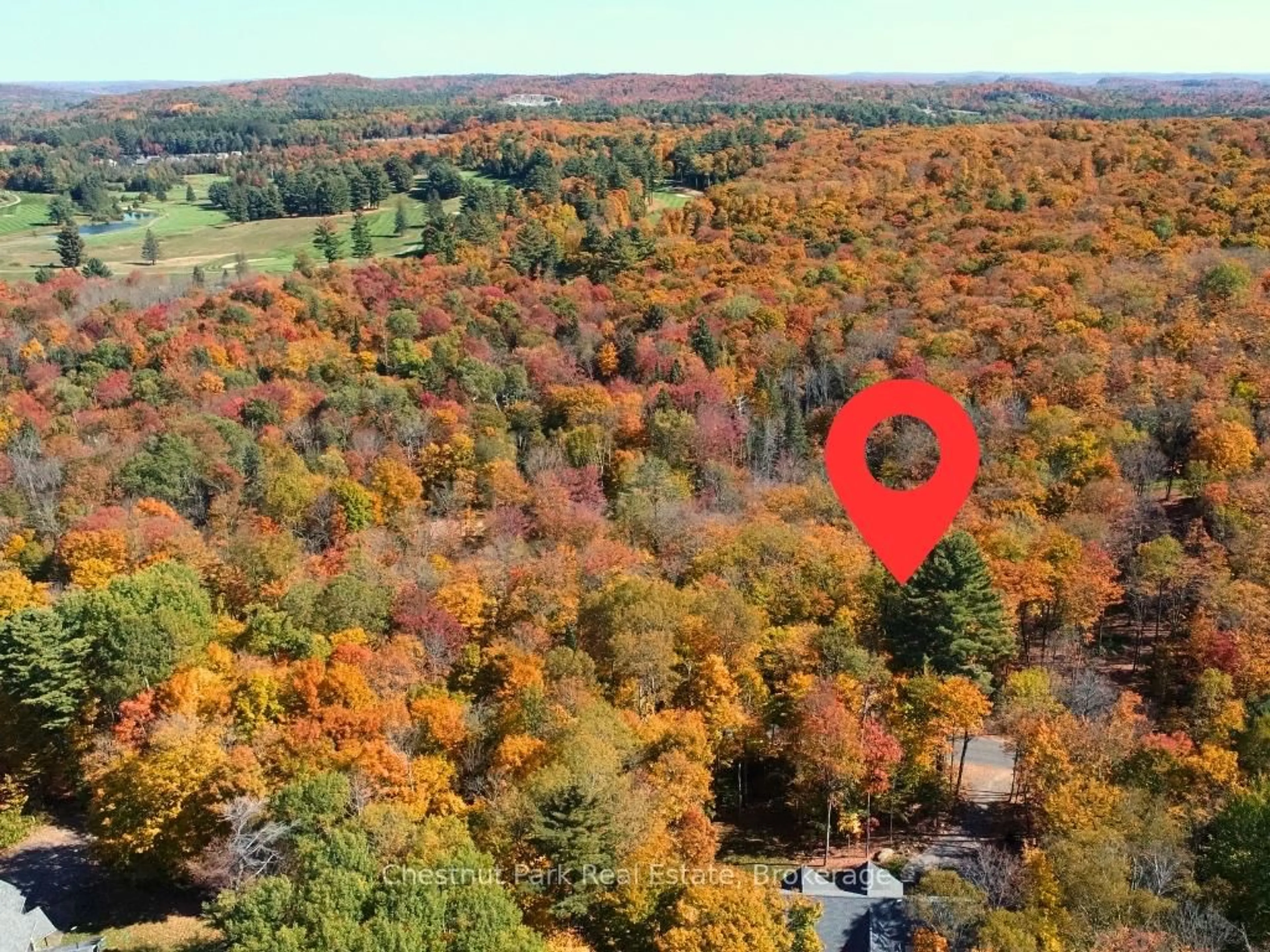 A pic from outside/outdoor area/front of a property/back of a property/a pic from drone, forest/trees view for 384 Golf Course Rd, Huntsville Ontario P1H 1N8