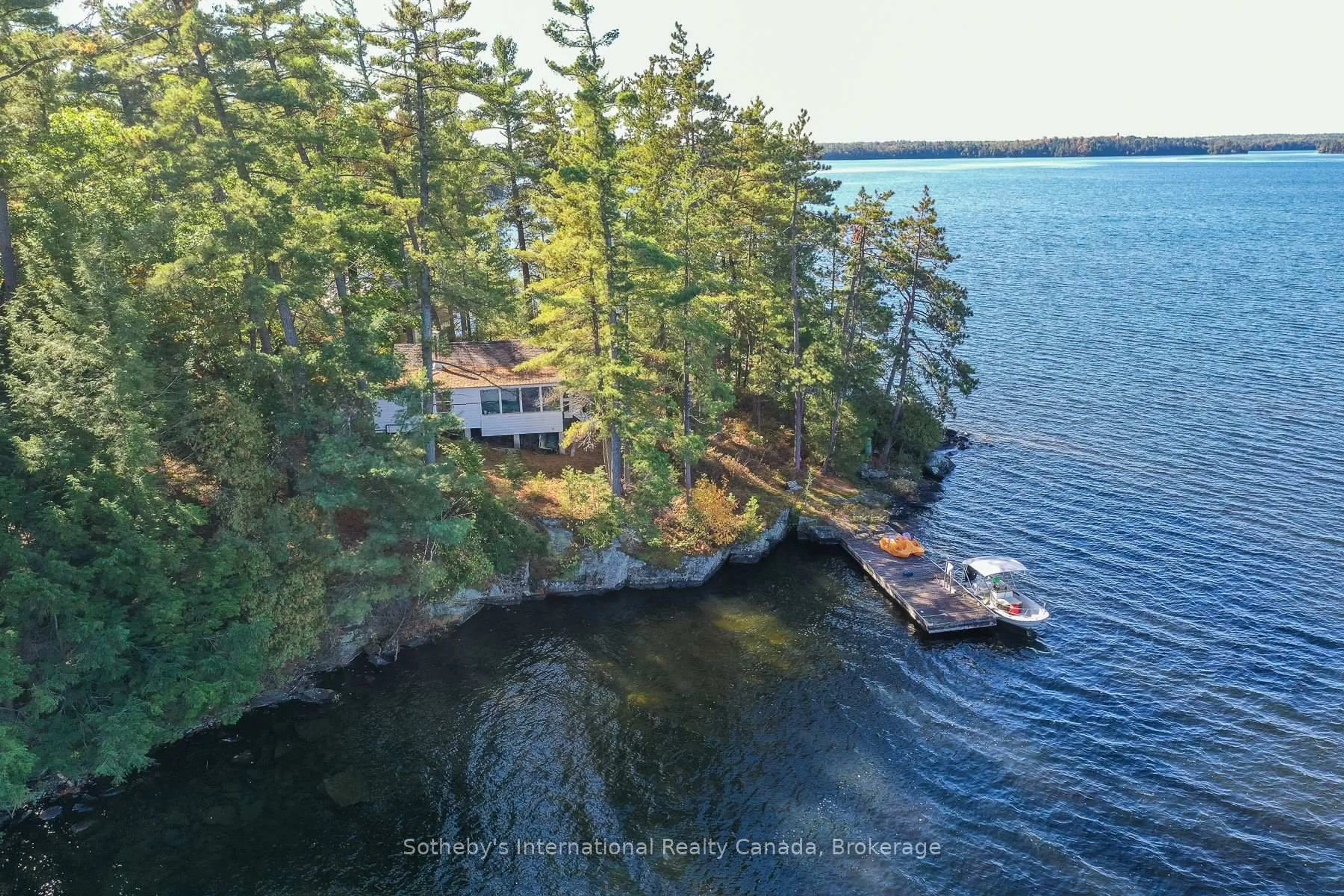 A pic from outside/outdoor area/front of a property/back of a property/a pic from drone, water/lake/river/ocean view for 1326 Browning Island, Bracebridge Ontario P1L 1X2