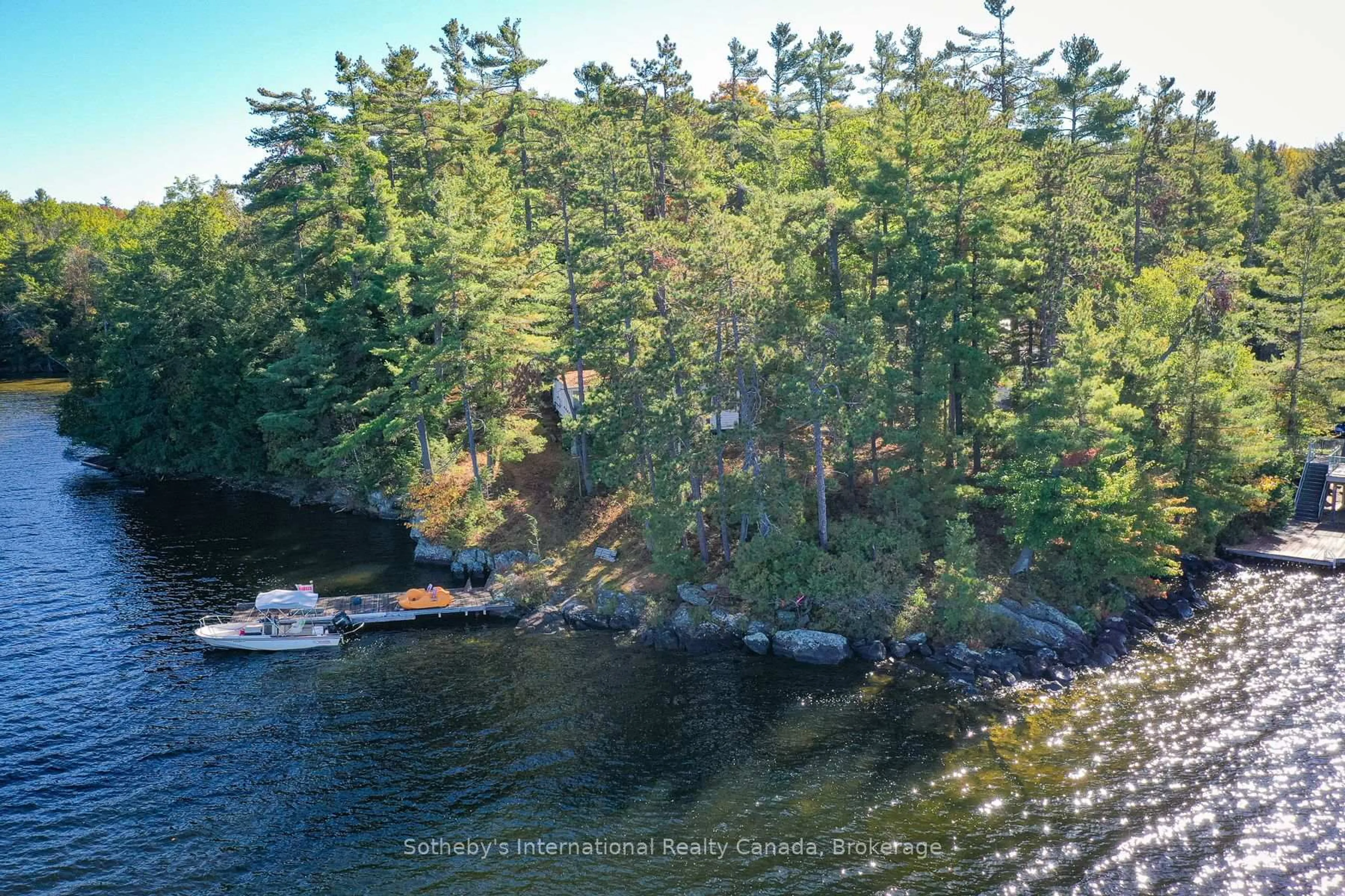 A pic from outside/outdoor area/front of a property/back of a property/a pic from drone, water/lake/river/ocean view for 1326 Browning Island, Bracebridge Ontario P1L 1X2