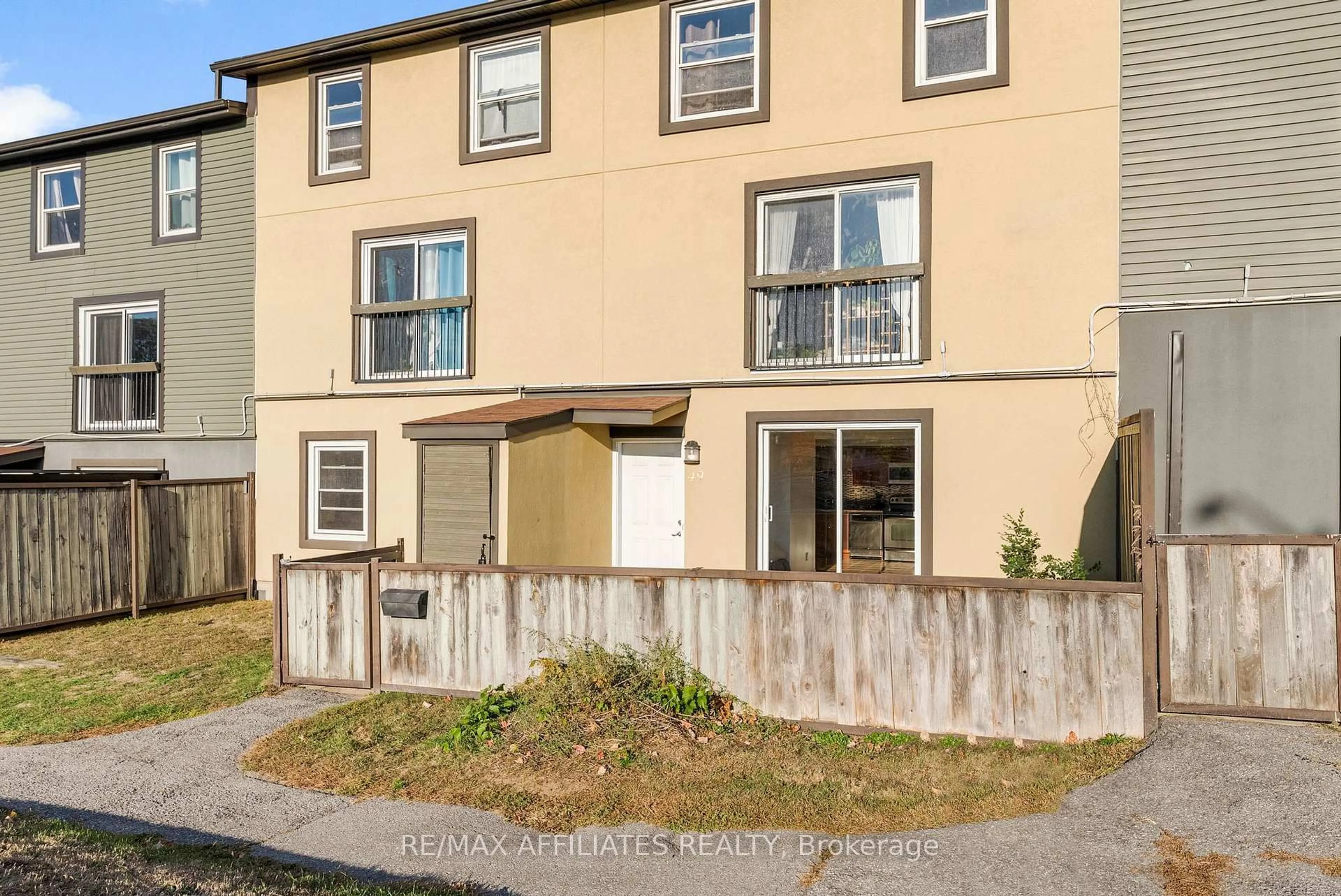 Home with vinyl exterior material, street for 1250 McWatters Rd #49, Ottawa Ontario K2C 3P5