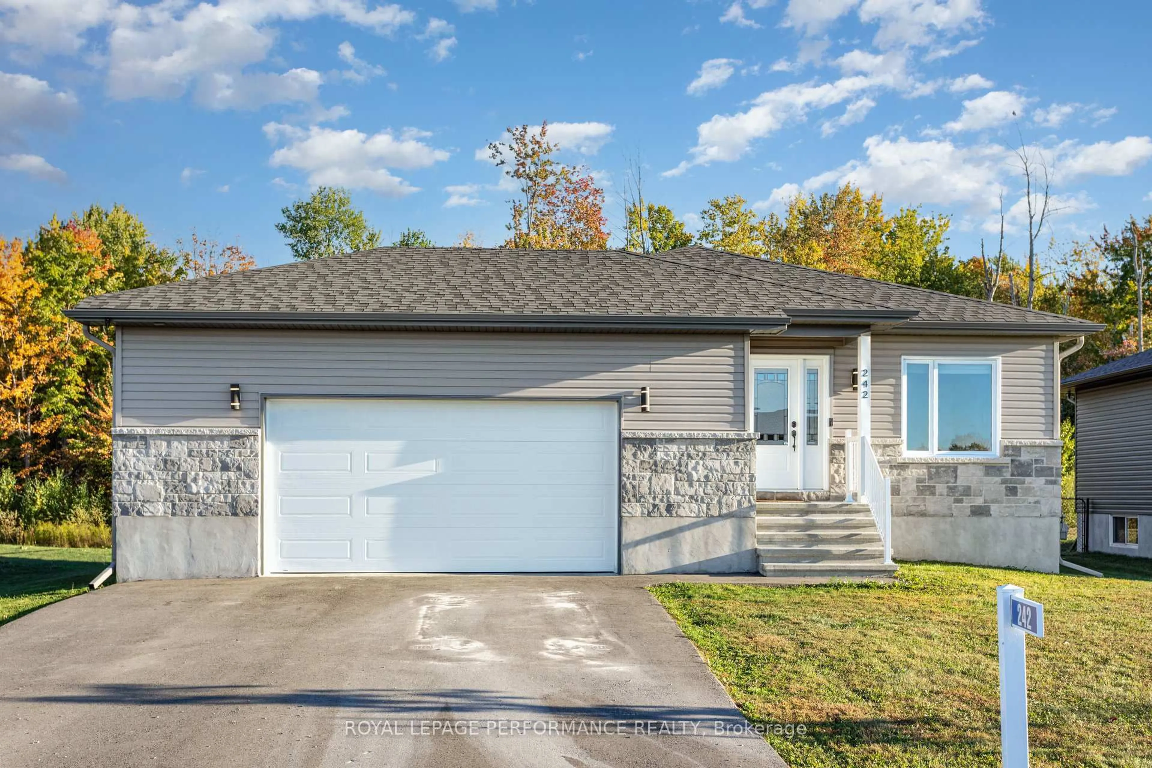 Home with vinyl exterior material, street for 242 Roxanne St, Clarence-Rockland Ontario K0A 1N0