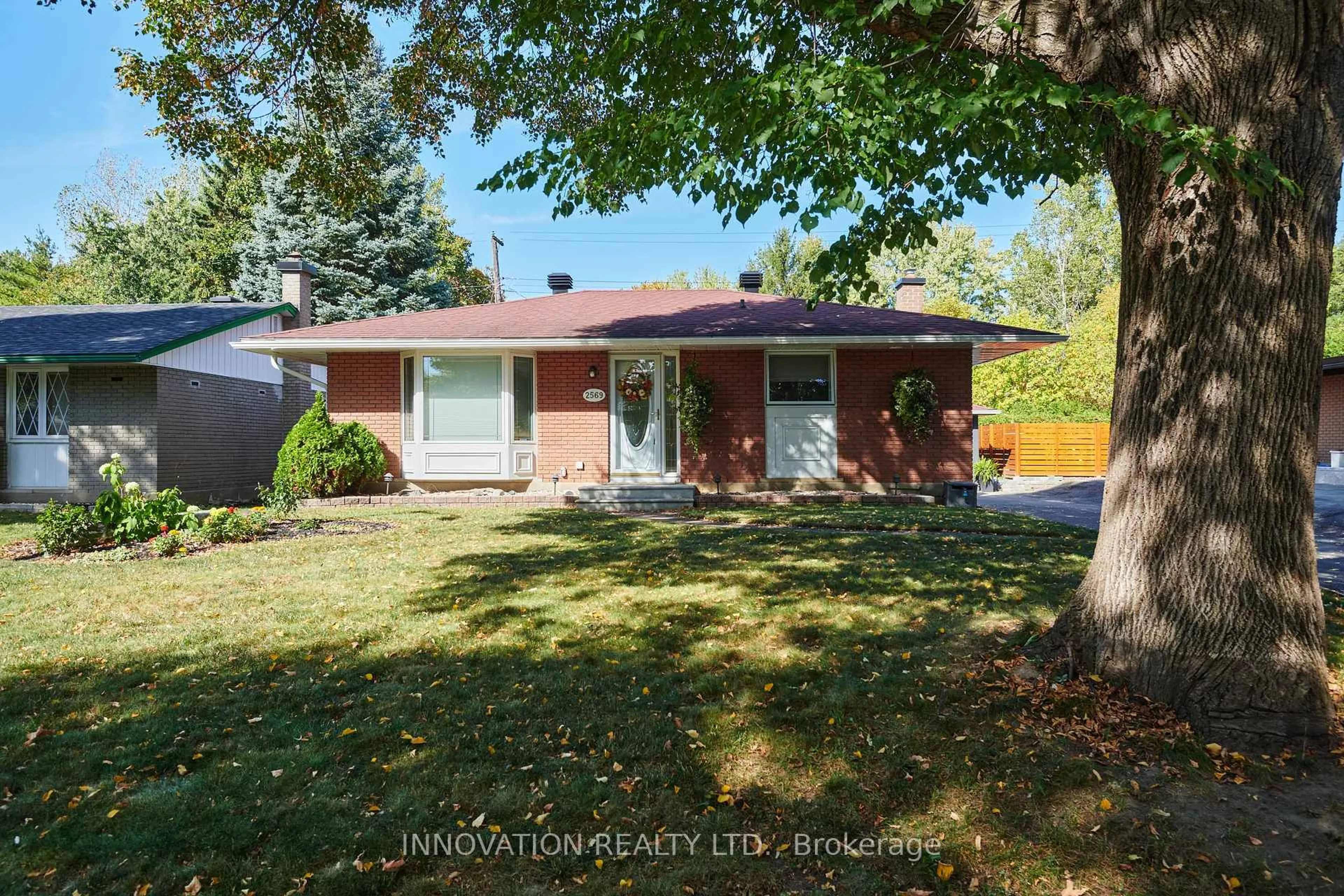 Home with brick exterior material, street for 2569 Hanlon Ave, Ottawa Ontario K2B 7X2