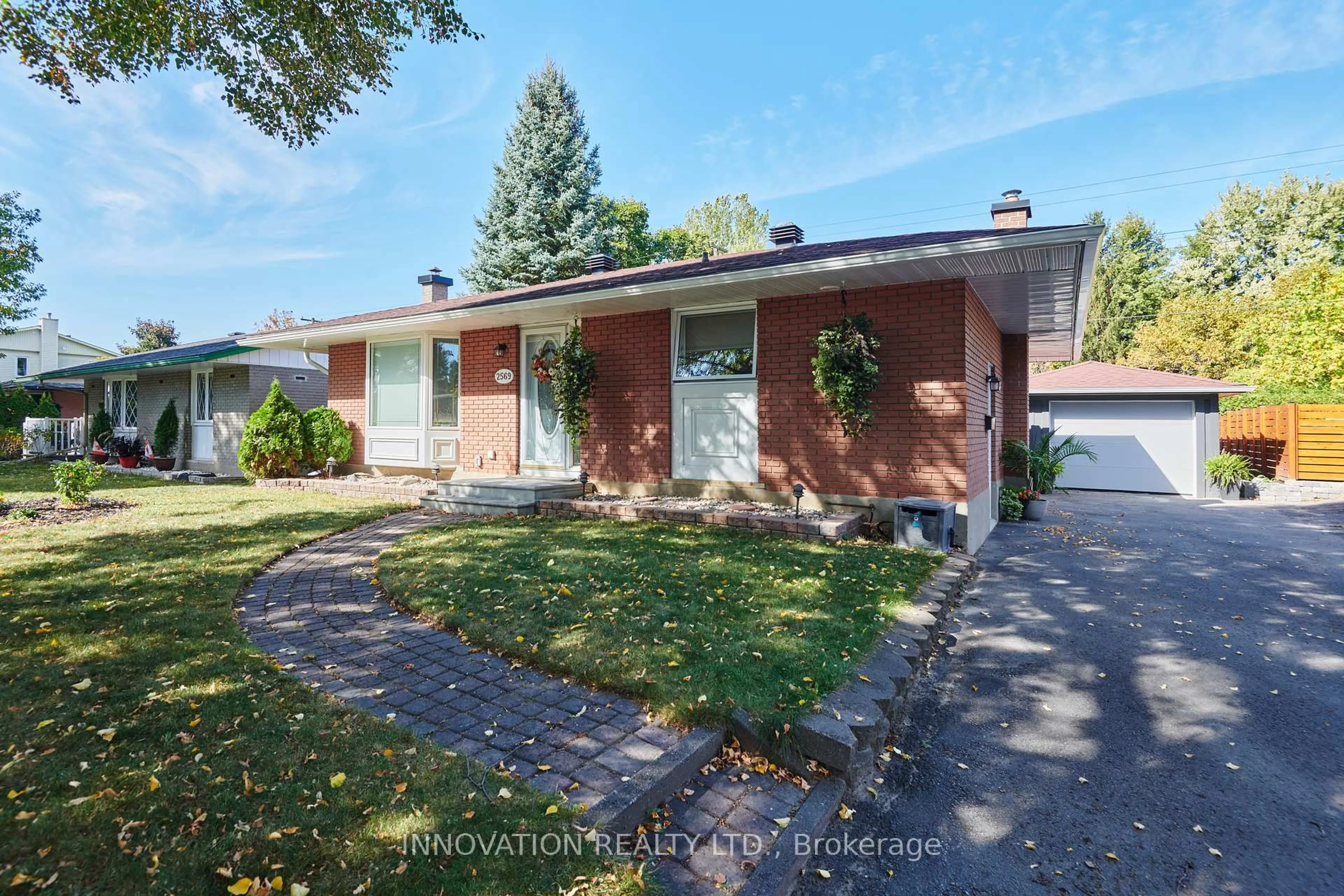 Home with brick exterior material, street for 2569 Hanlon Ave, Ottawa Ontario K2B 7X2