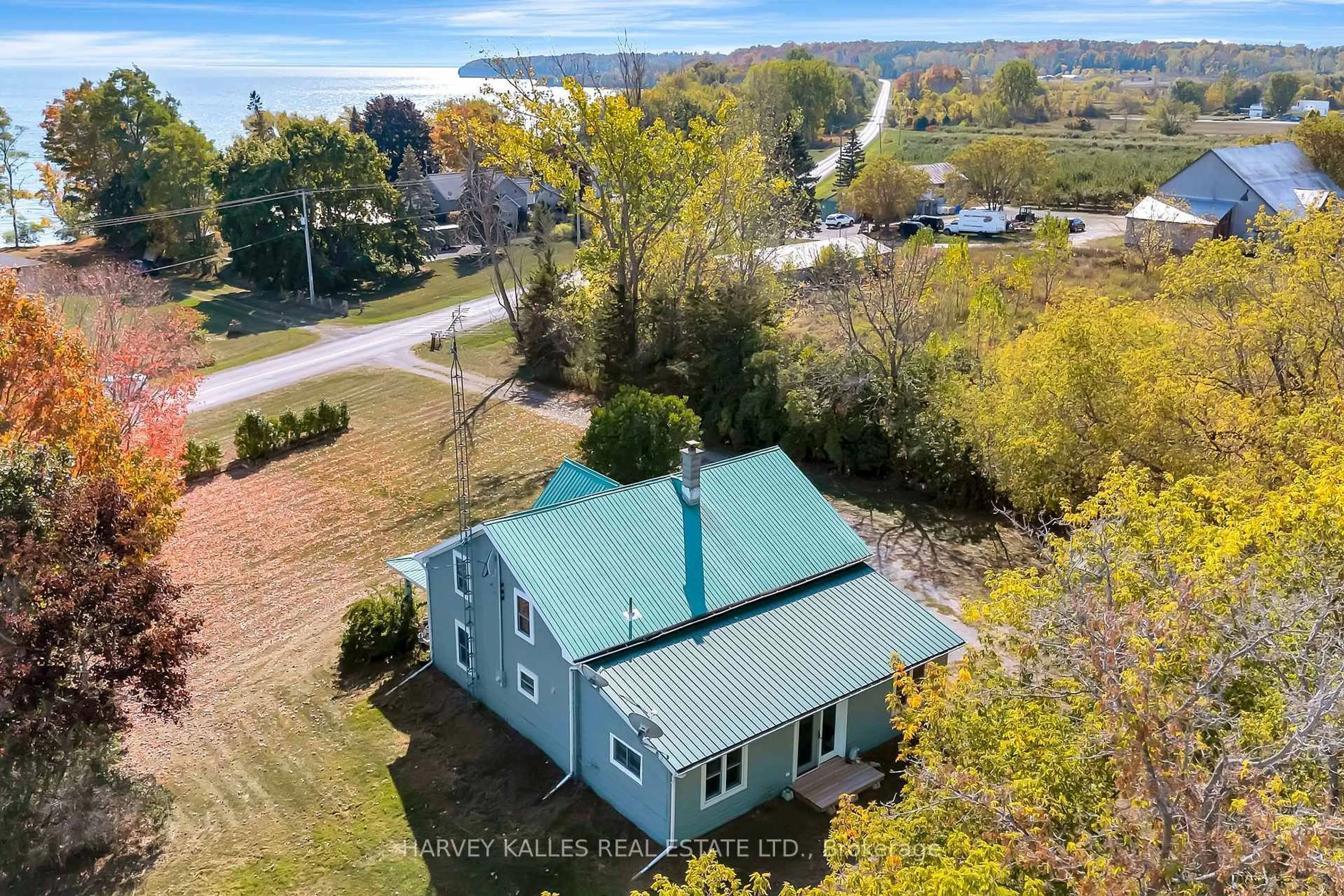 A pic from outside/outdoor area/front of a property/back of a property/a pic from drone, water/lake/river/ocean view for 4427 County Rd #8, Prince Edward County Ontario K0K 2T0