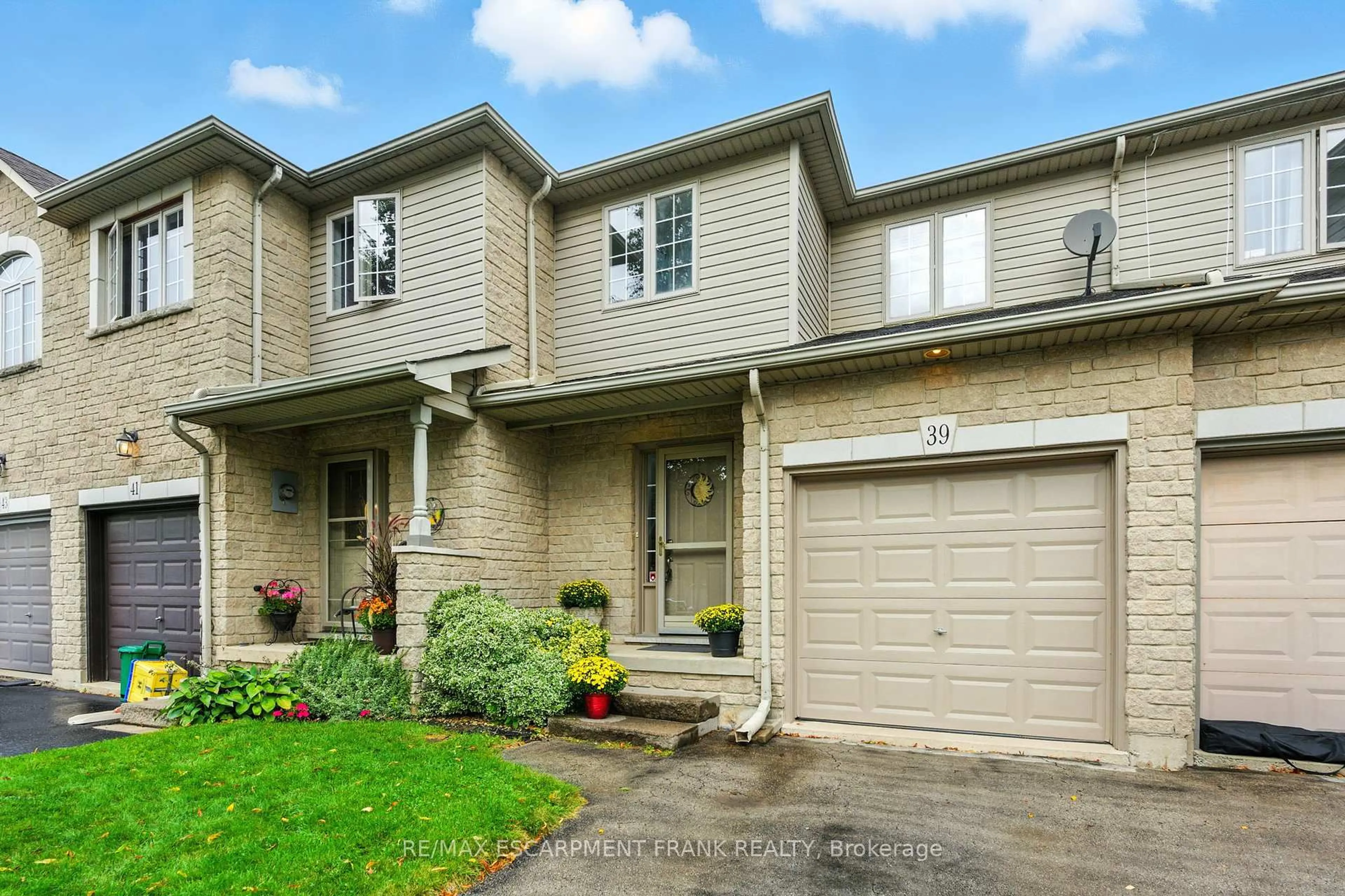 Home with brick exterior material, street for 39 Foxborough Dr, Hamilton Ontario L9G 4Y9