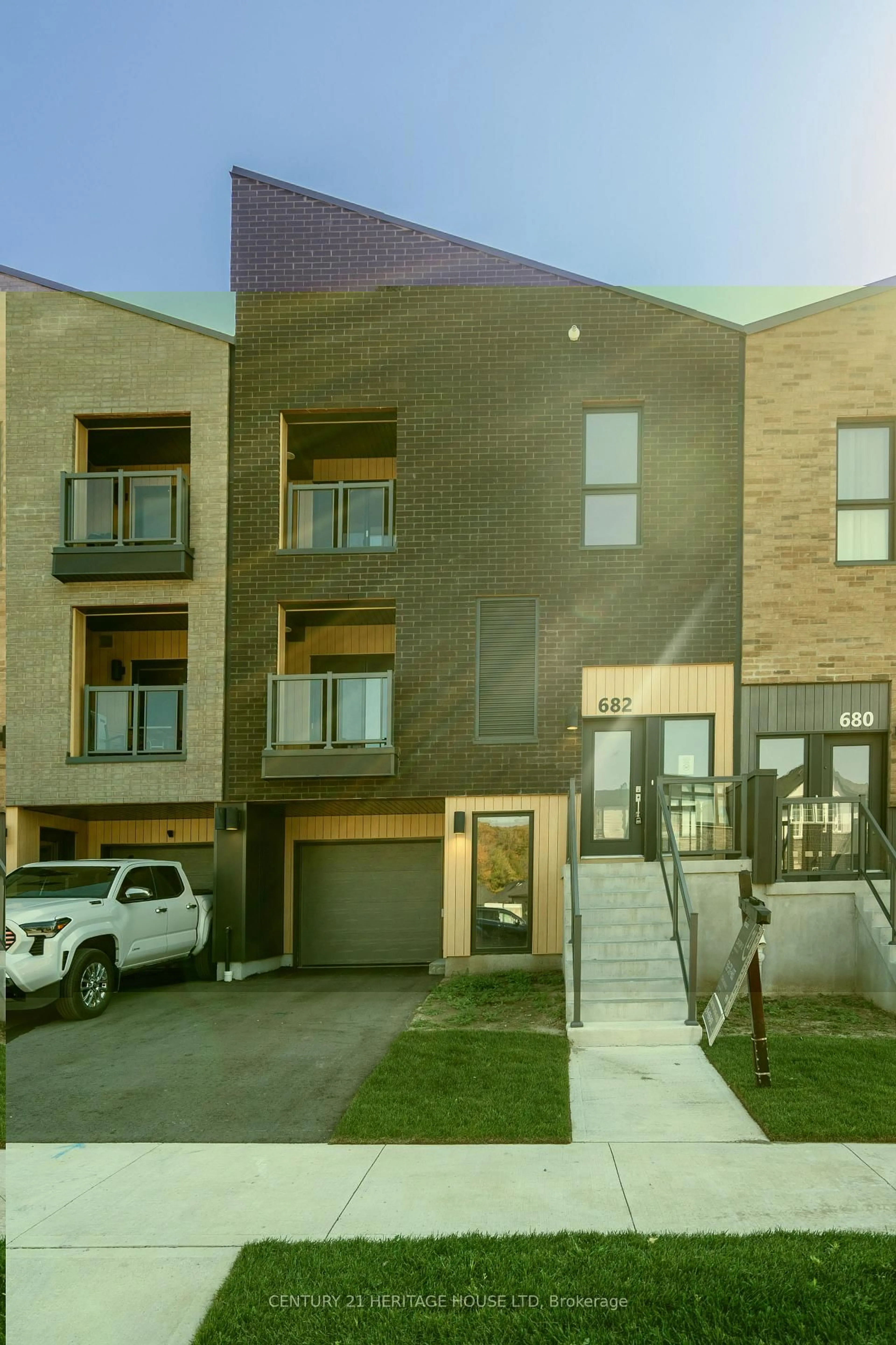 Home with brick exterior material, street for 682 Benninger Dr, Kitchener Ontario N2E 0J4