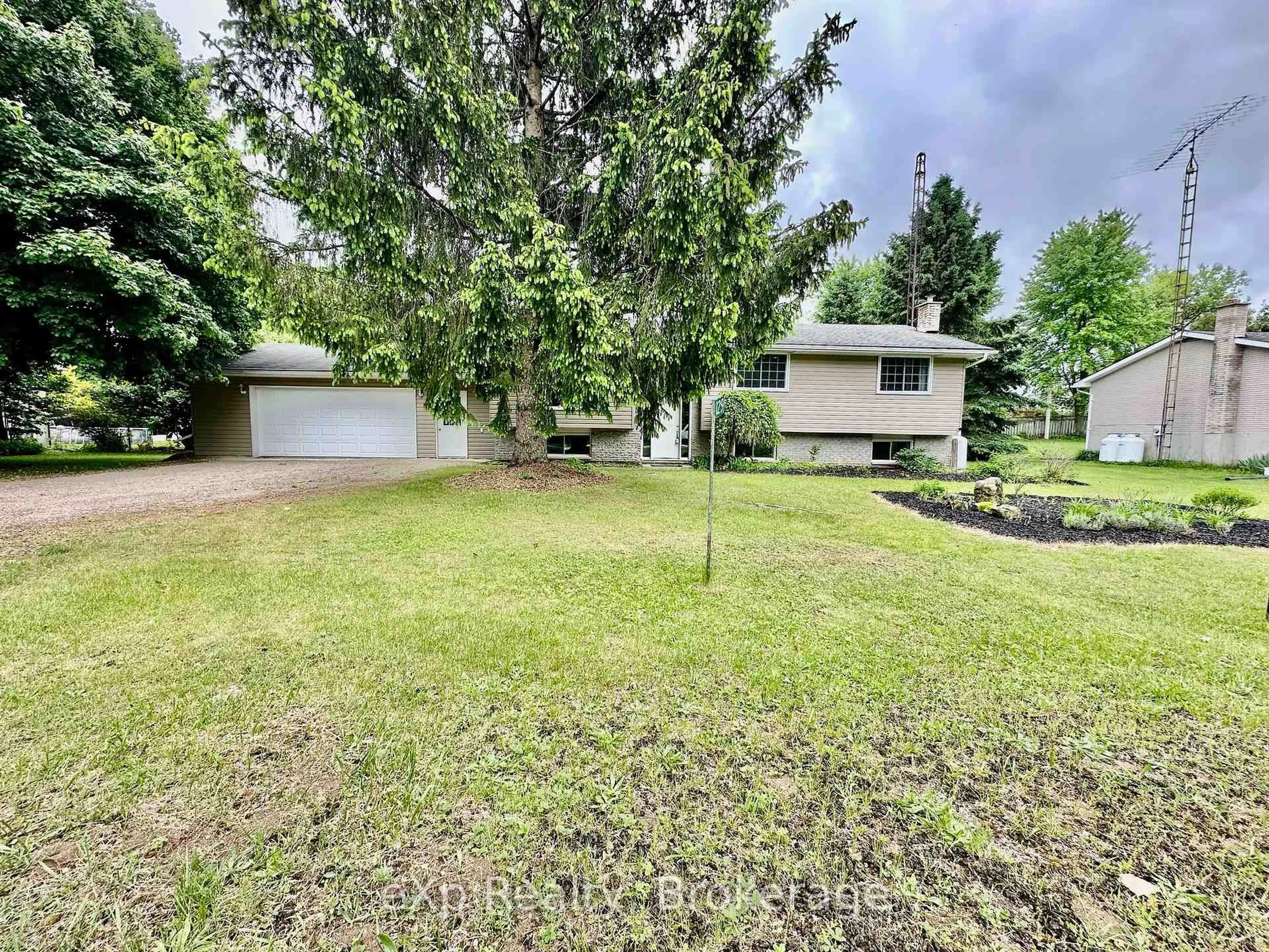 A pic from outside/outdoor area/front of a property/back of a property/a pic from drone, unknown for 129 Westfall Cres, West Grey Ontario N4N 3B9