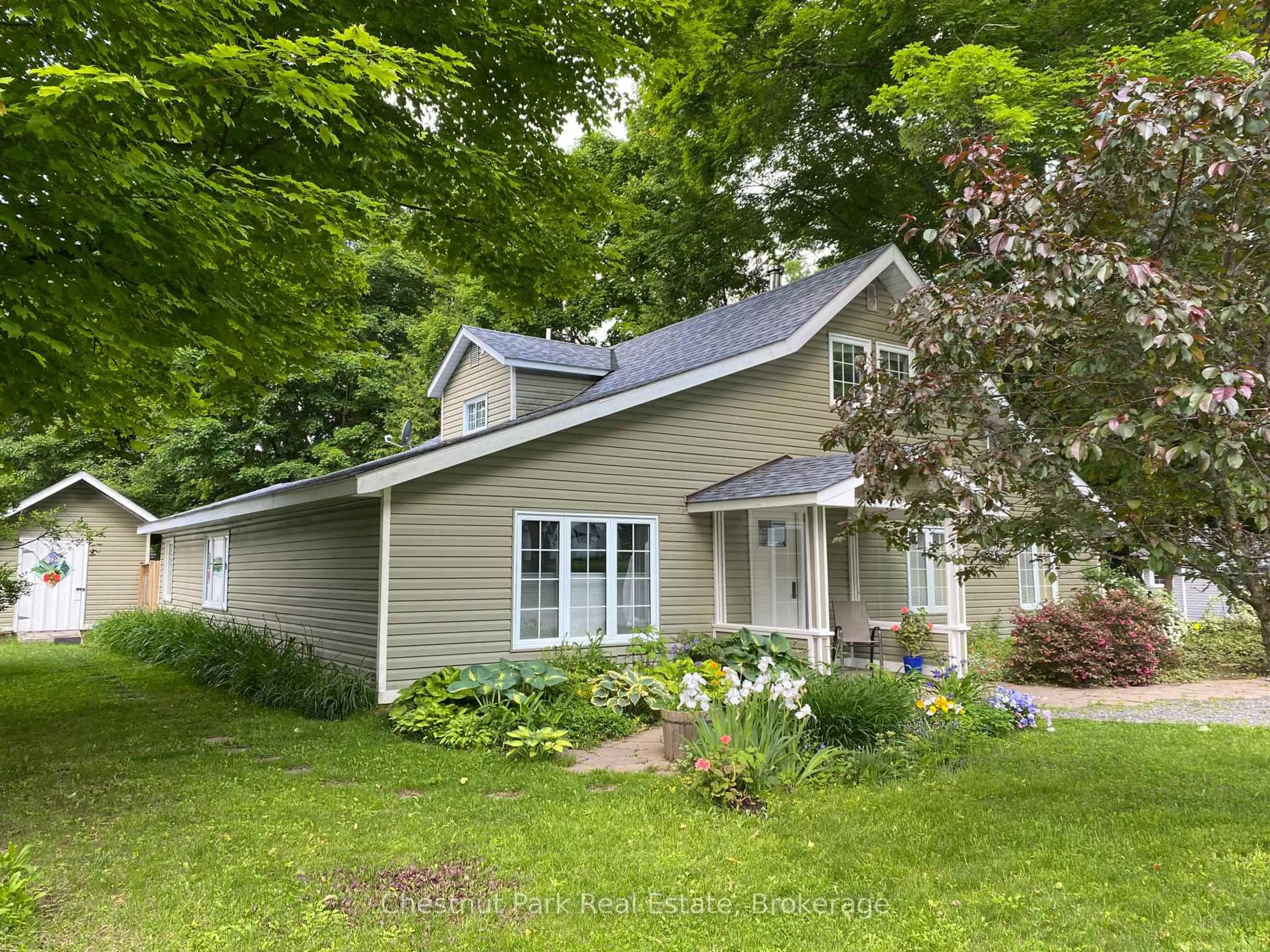 Home with vinyl exterior material, street for 1226 Milford Bay Rd, Muskoka Lakes Ontario P0B 1E0