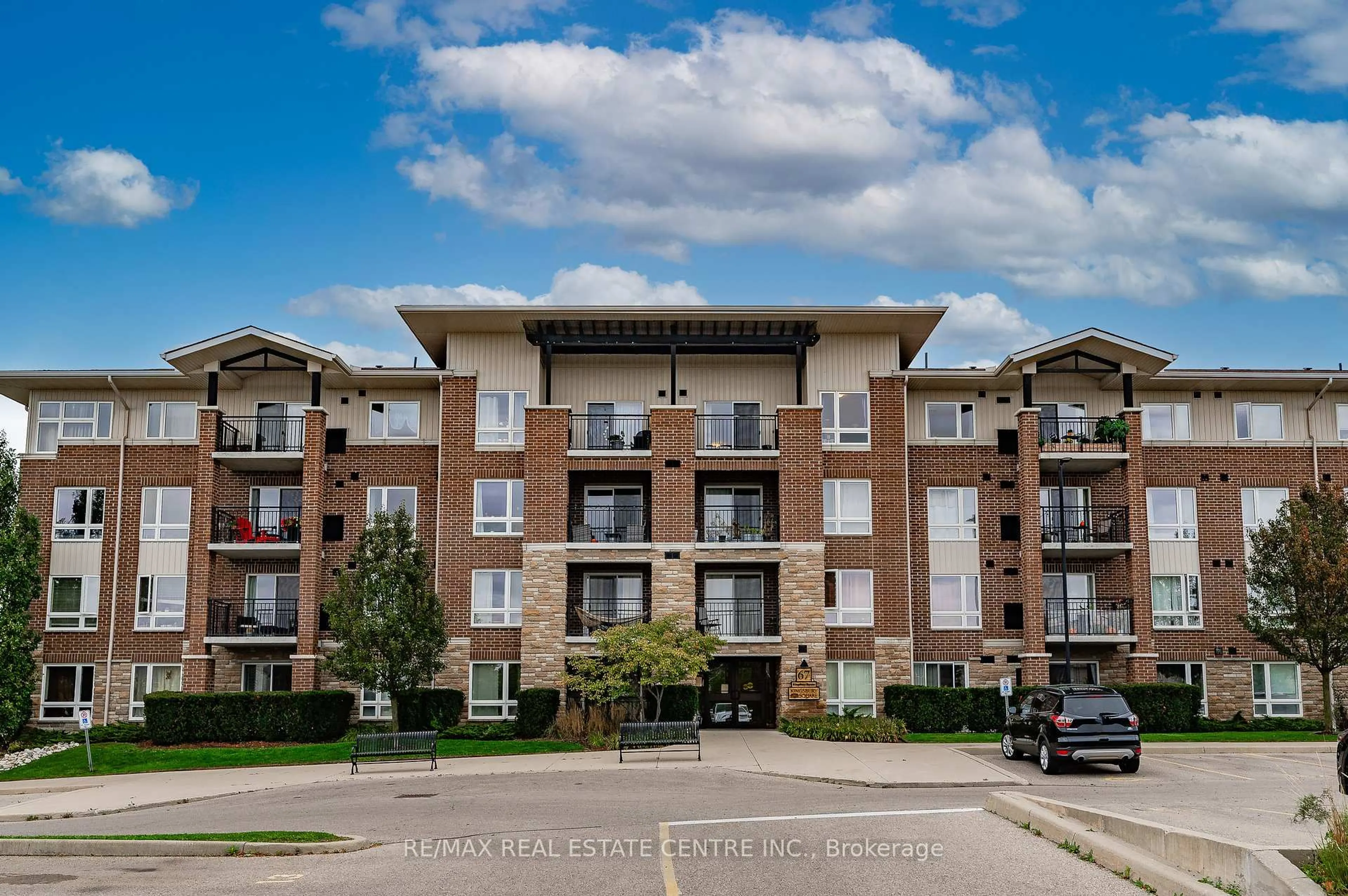 A pic from outside/outdoor area/front of a property/back of a property/a pic from drone, unknown for 67 Kingsbury Sq #411, Guelph Ontario N1L 0L3