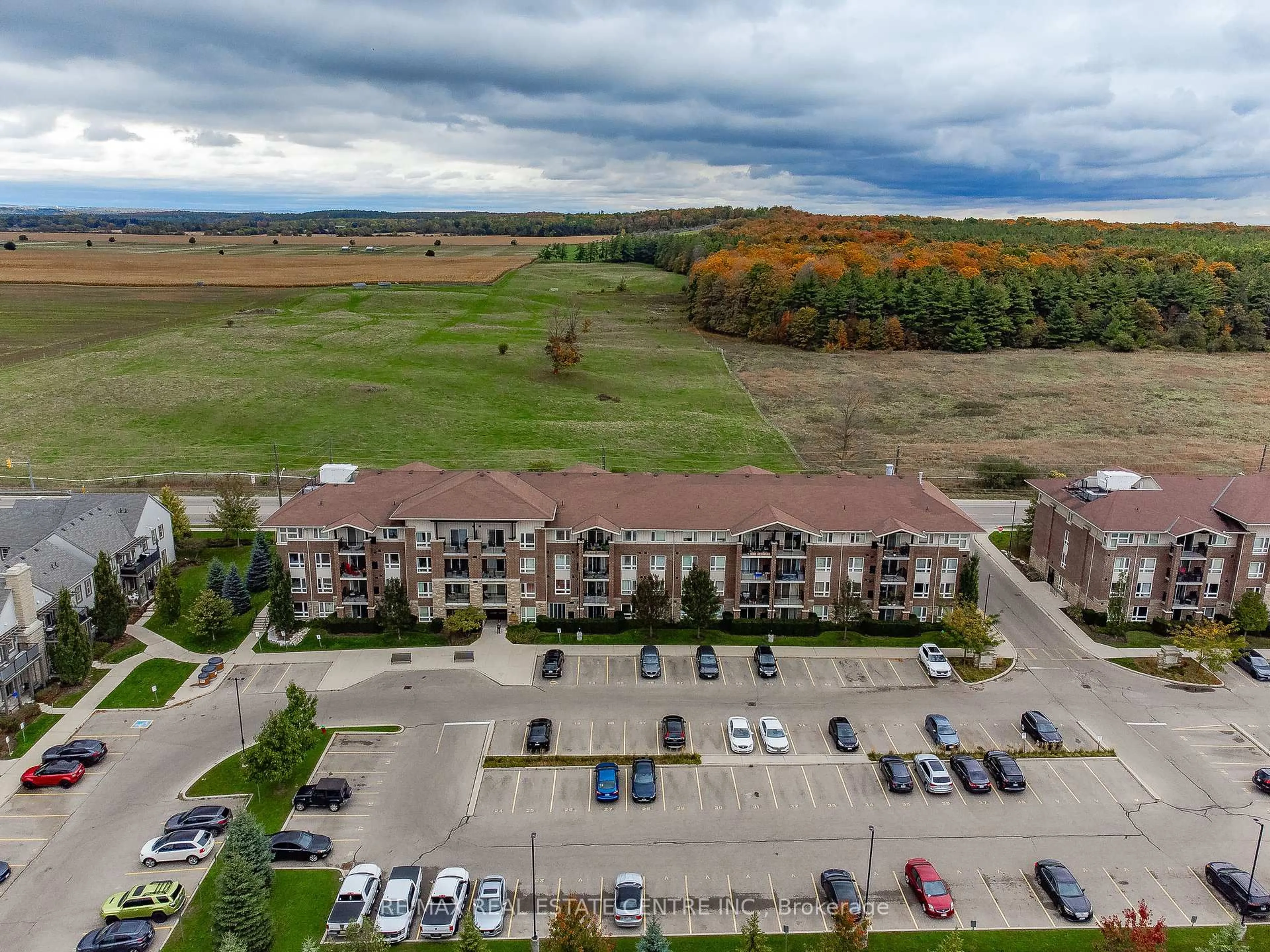 A pic from outside/outdoor area/front of a property/back of a property/a pic from drone, mountain view for 67 Kingsbury Sq #411, Guelph Ontario N1L 0L3