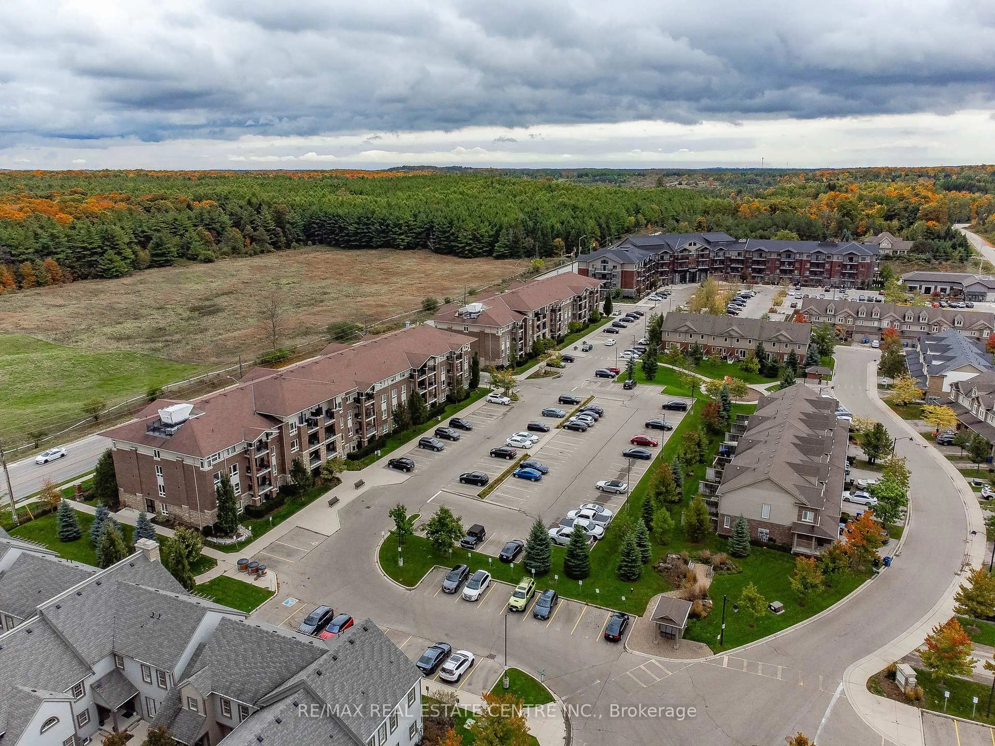 A pic from outside/outdoor area/front of a property/back of a property/a pic from drone, unknown for 67 Kingsbury Sq #411, Guelph Ontario N1L 0L3