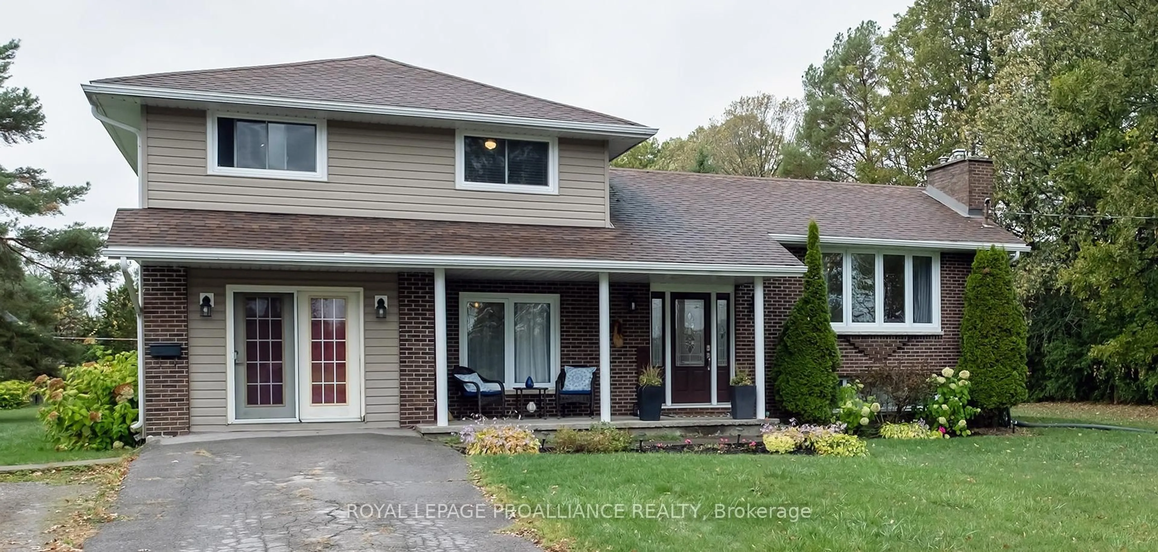 Home with vinyl exterior material, street for 208 Ritz Rd, Corbyville Ontario K0K 1V0