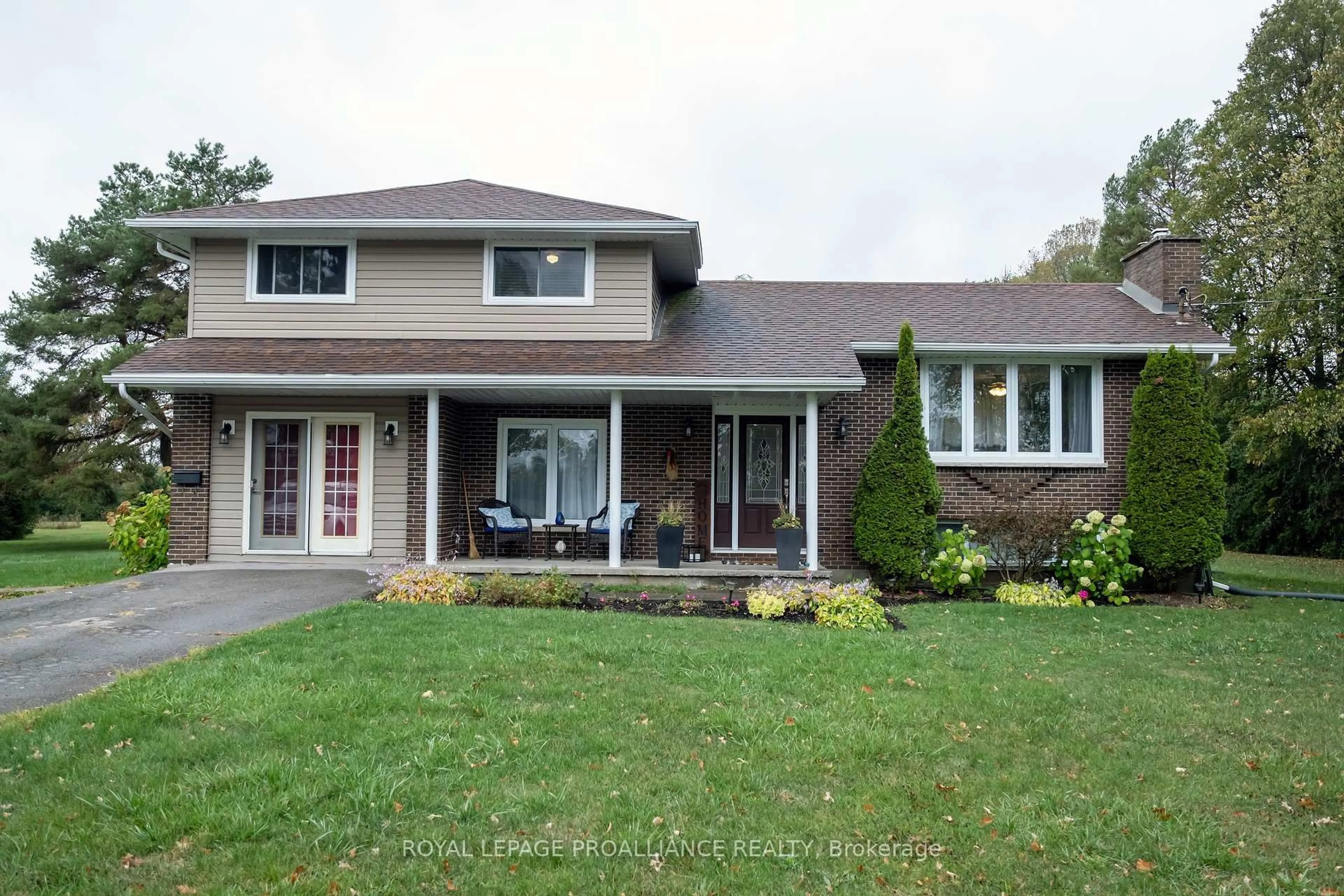 Home with vinyl exterior material, street for 208 Ritz Rd, Corbyville Ontario K0K 1V0
