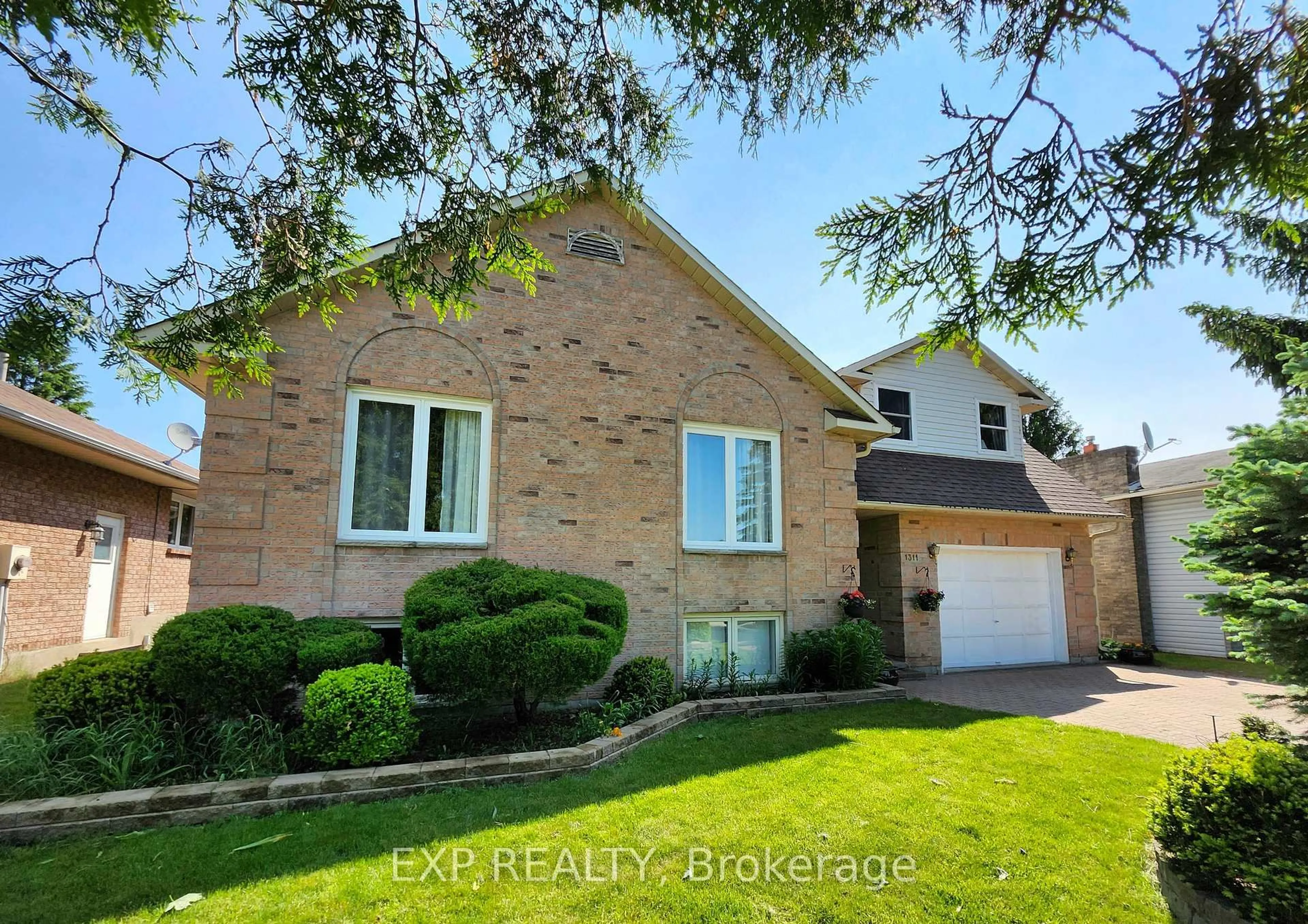 Home with brick exterior material, street for 1311 Cuthbertson Ave, Brockville Ontario K6V 6Y2